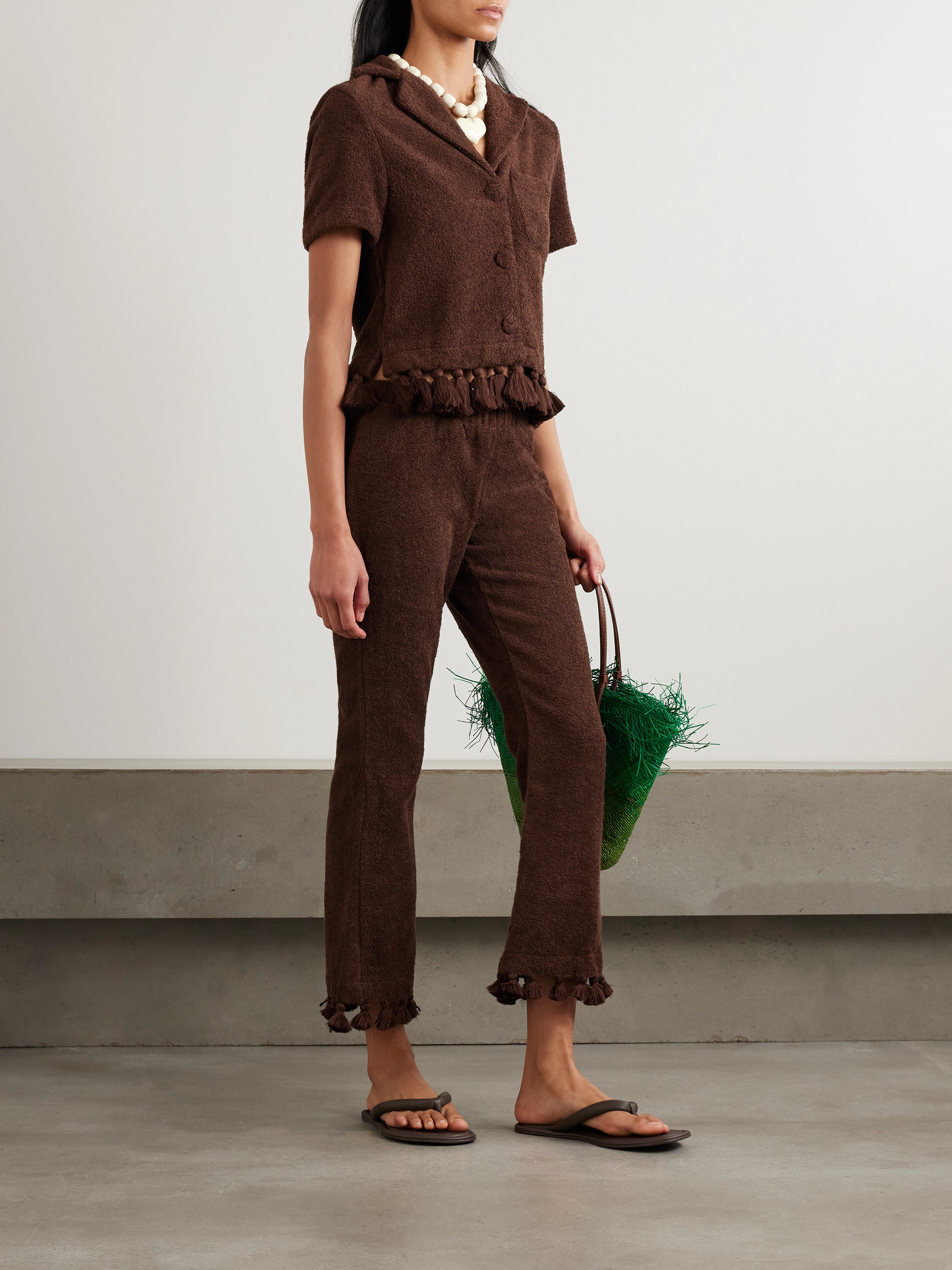 CAP D'ANTIBES Cropped flared tasseled cotton-terry pants