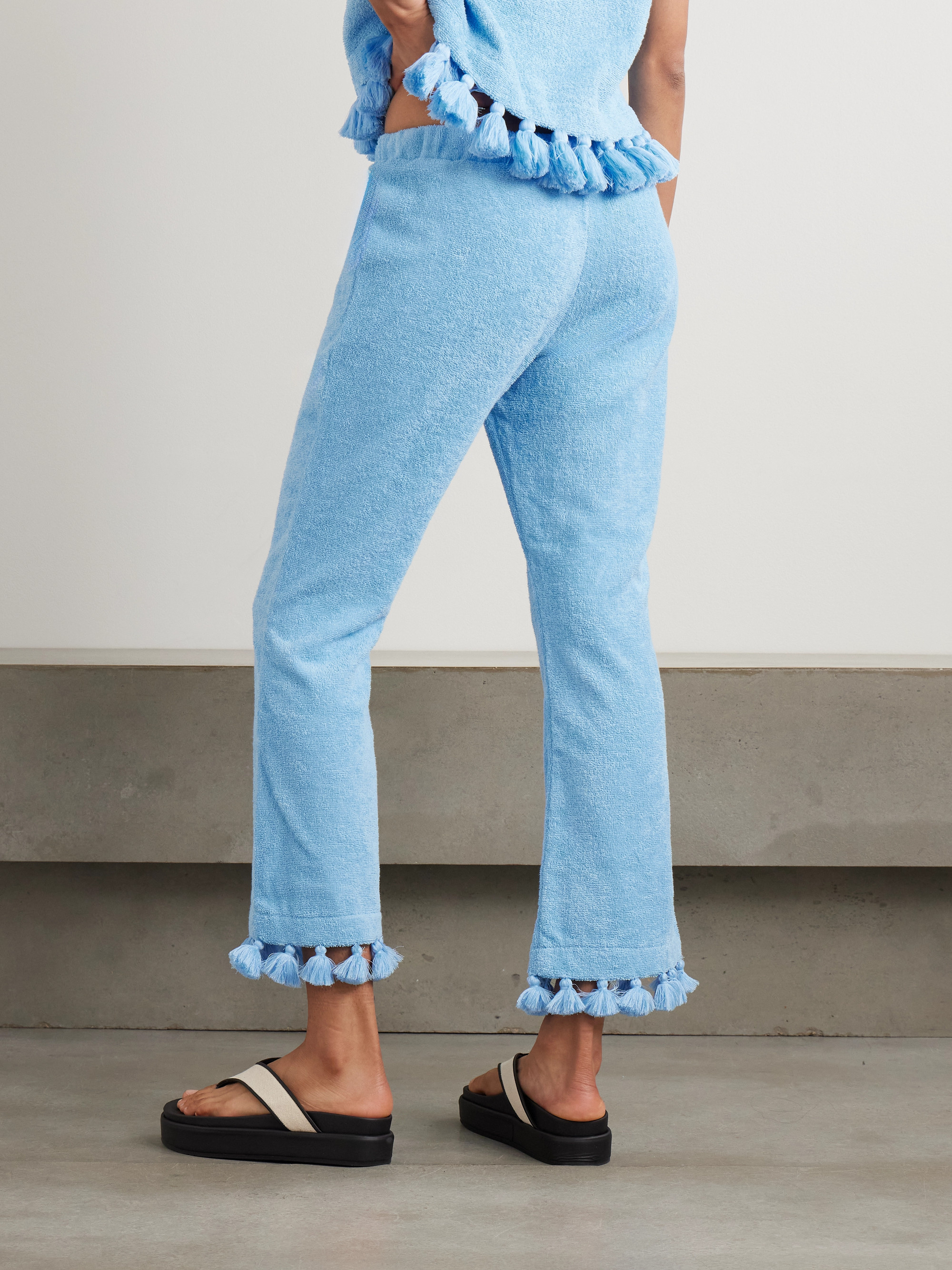 CAP D'ANTIBES Cropped flared tasseled cotton-terry pants