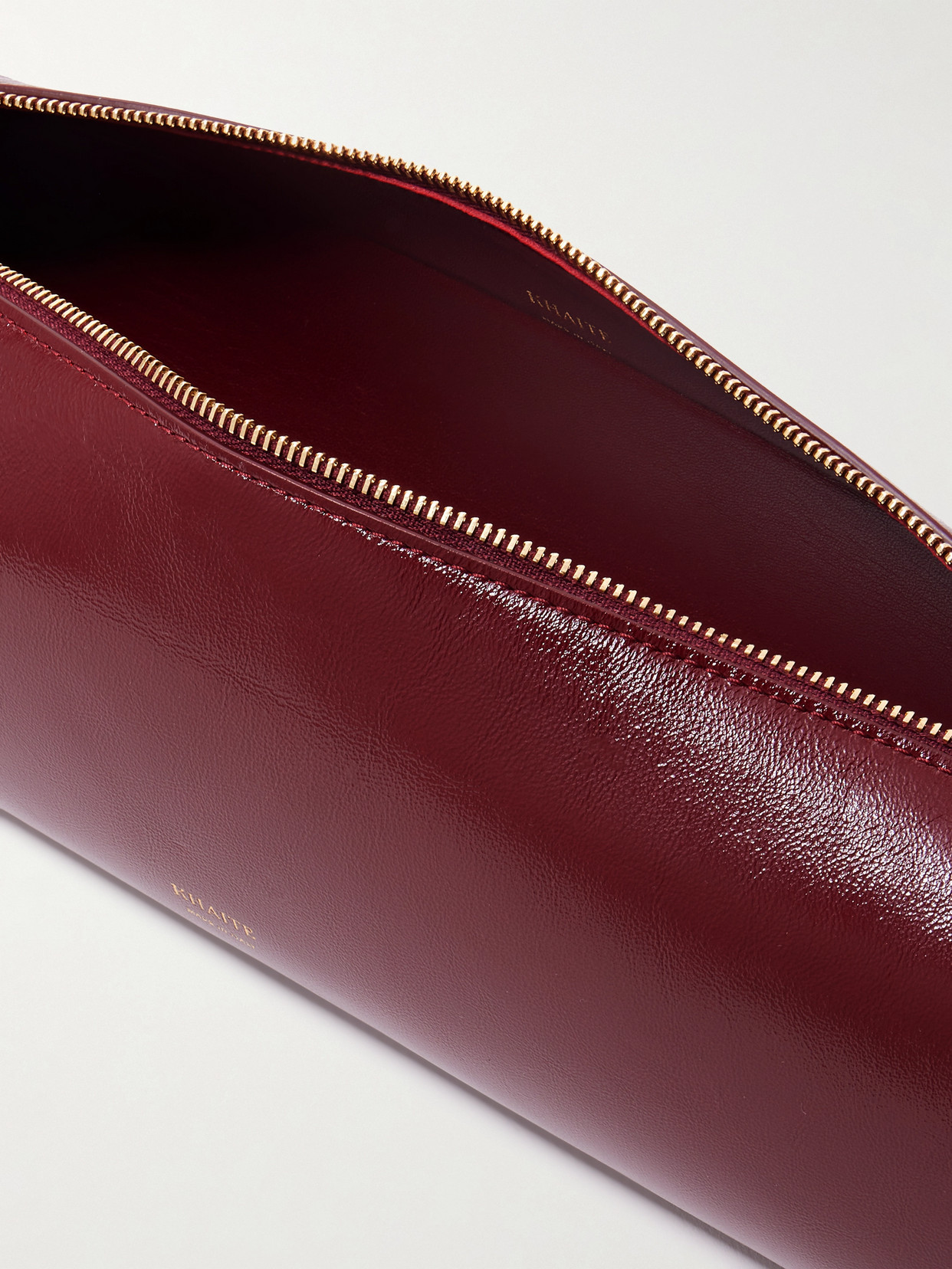 Khaite Kye Glossed-leather Shoulder Bag In Burgundy