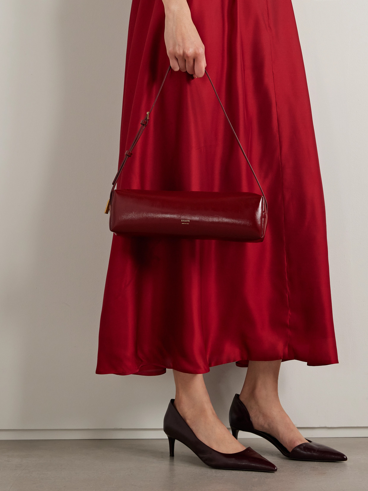 Khaite Kye Glossed-leather Shoulder Bag In Burgundy