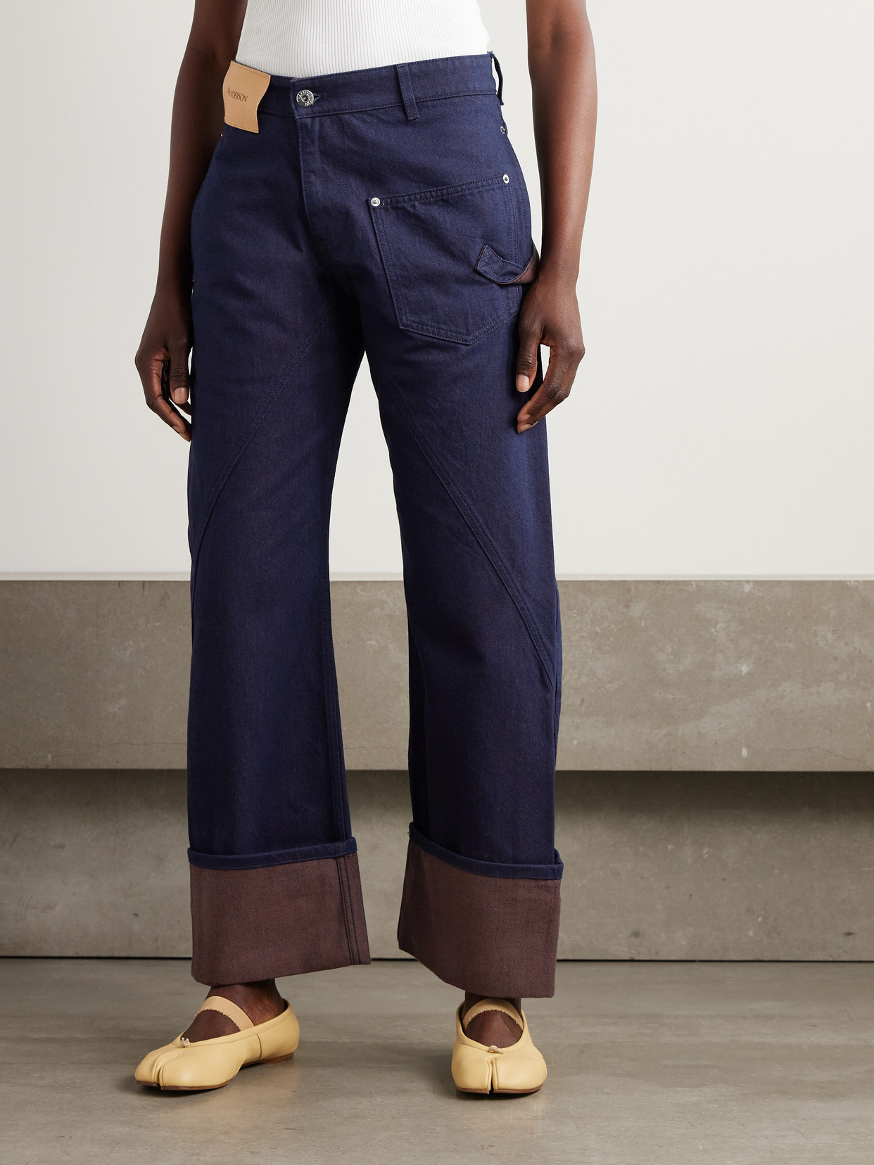 Jw Anderson Twisted Asymmetric High-rise Jeans In Blue