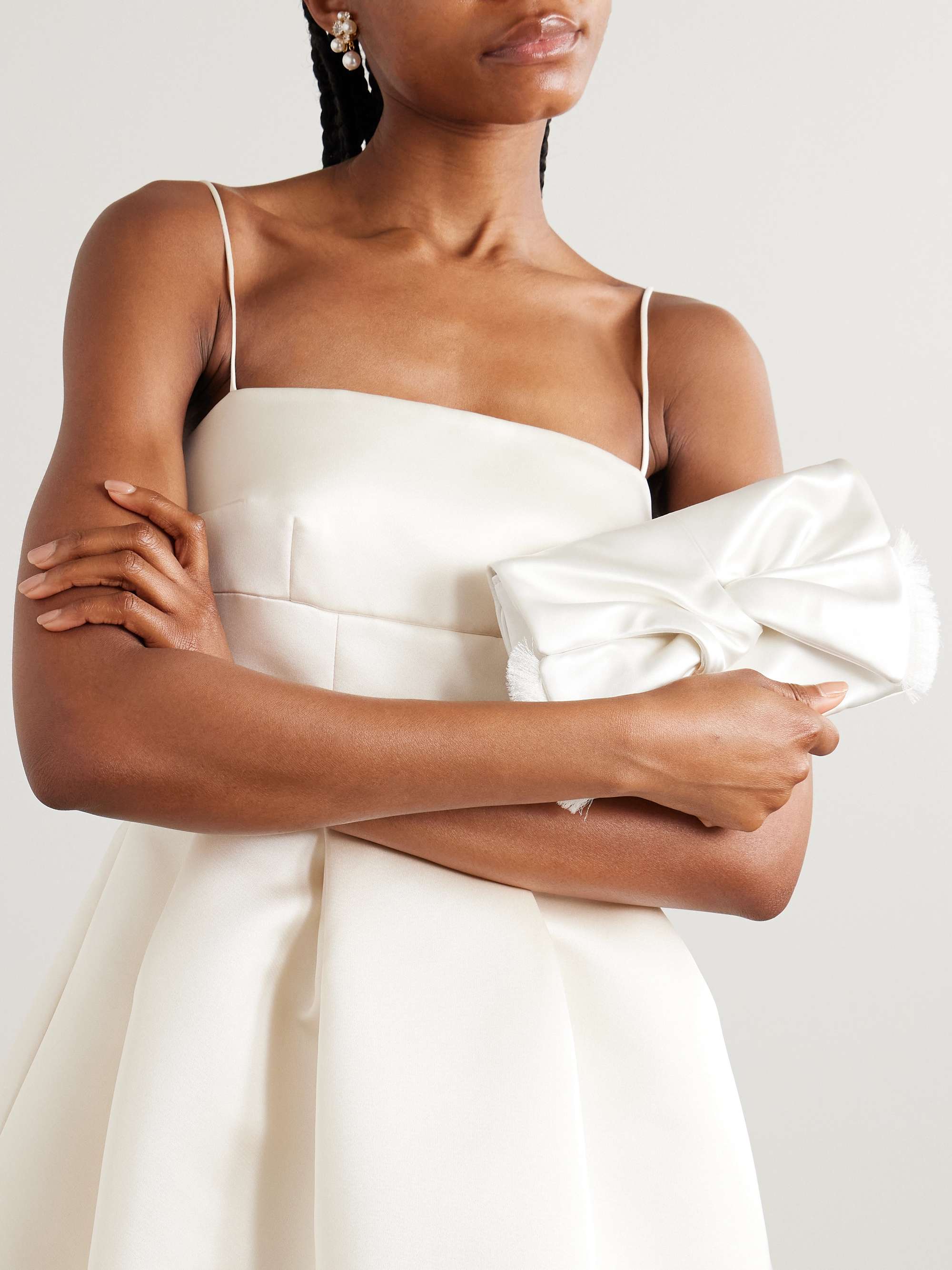 ANYA HINDMARCH Bow fringed satin clutch