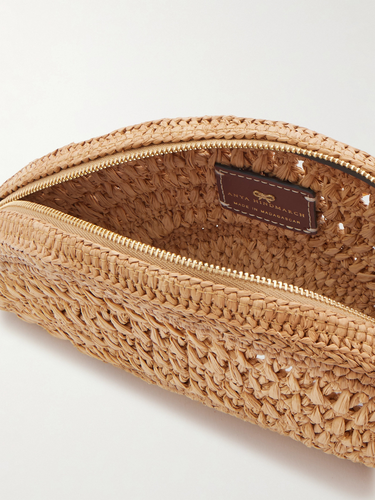 Anya Hindmarch Half Moon Bow Tasseled Leather-trimmed Raffia Clutch