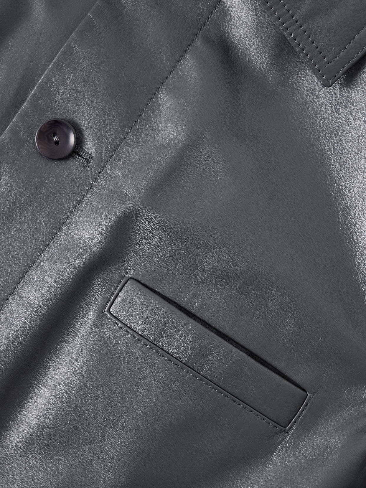 Lemaire Buttoned-up Elasticated Leather Jacket In Gray