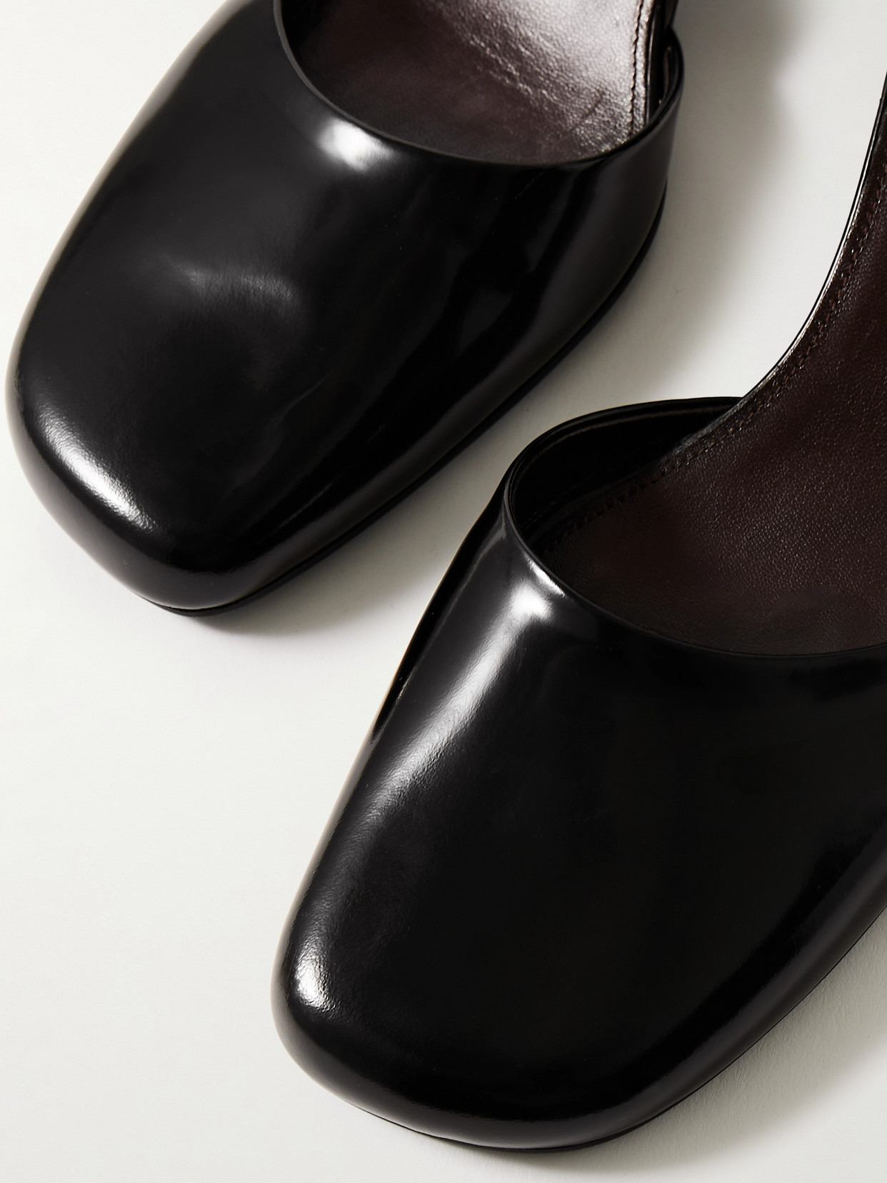 Penelope Glossed-Leather Pumps