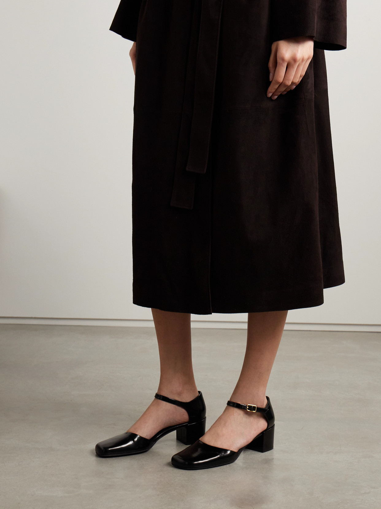 Penelope Glossed-Leather Pumps