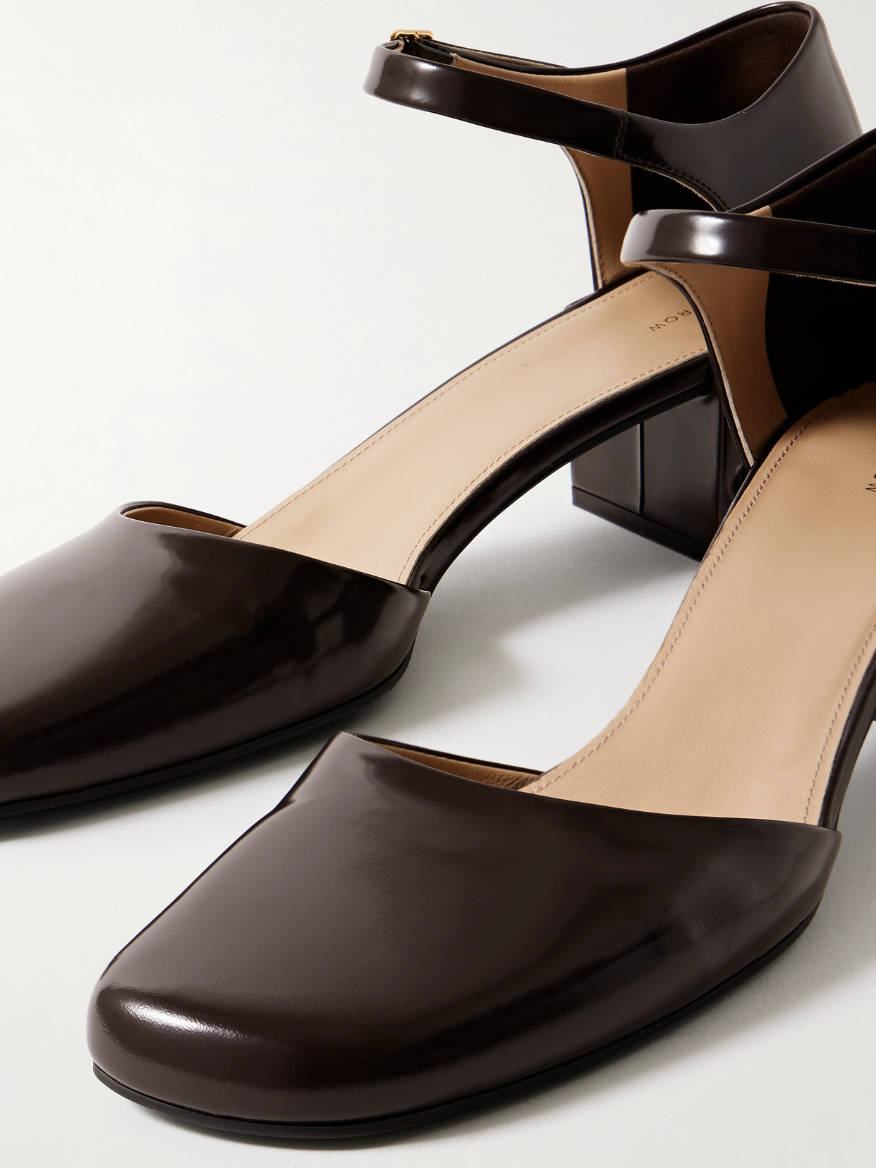 The Row Penelope Glossed-leather Pumps In Brown