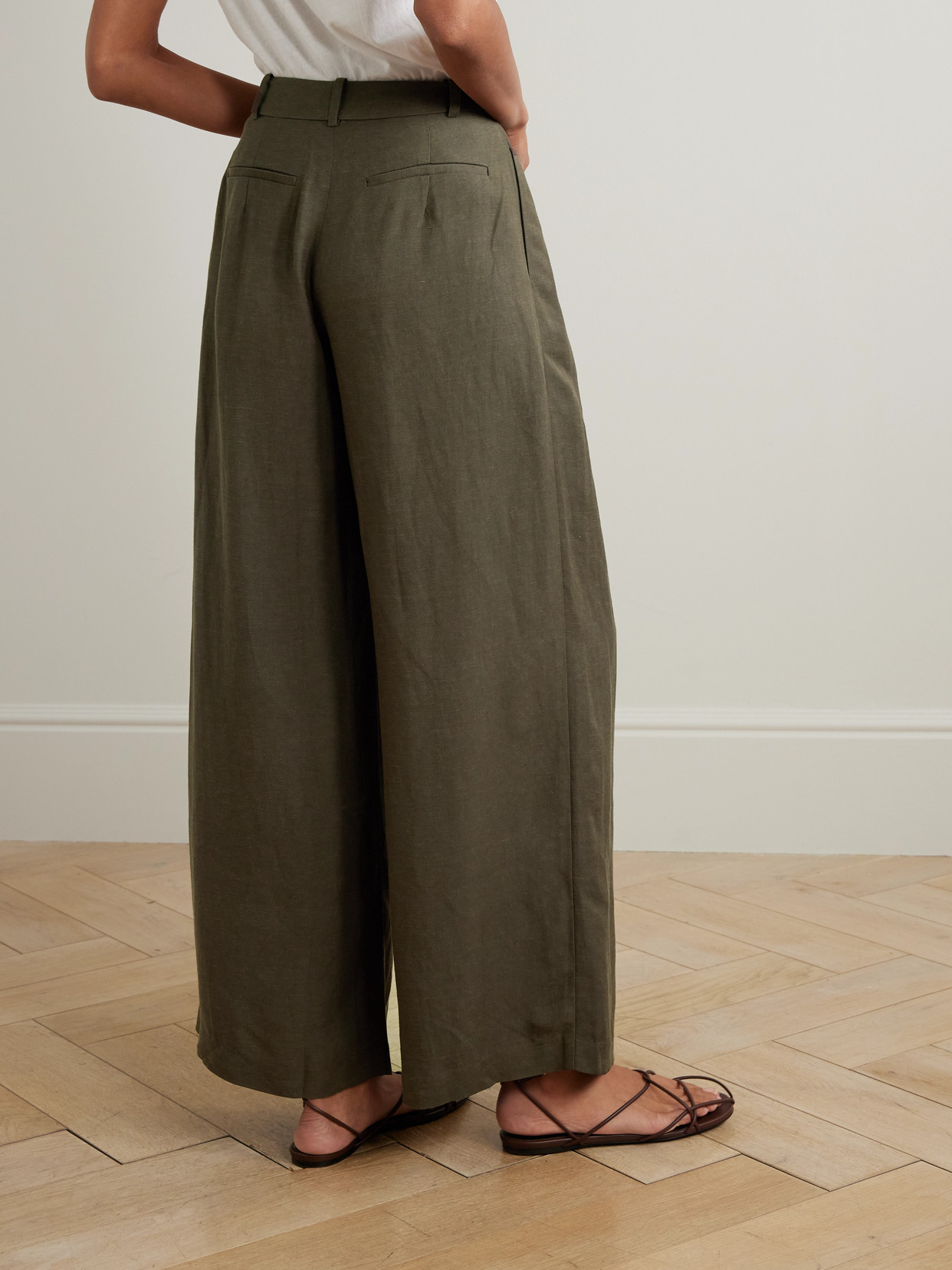 Faithfull Astrid Pleated Woven Wide-leg Pants In Green