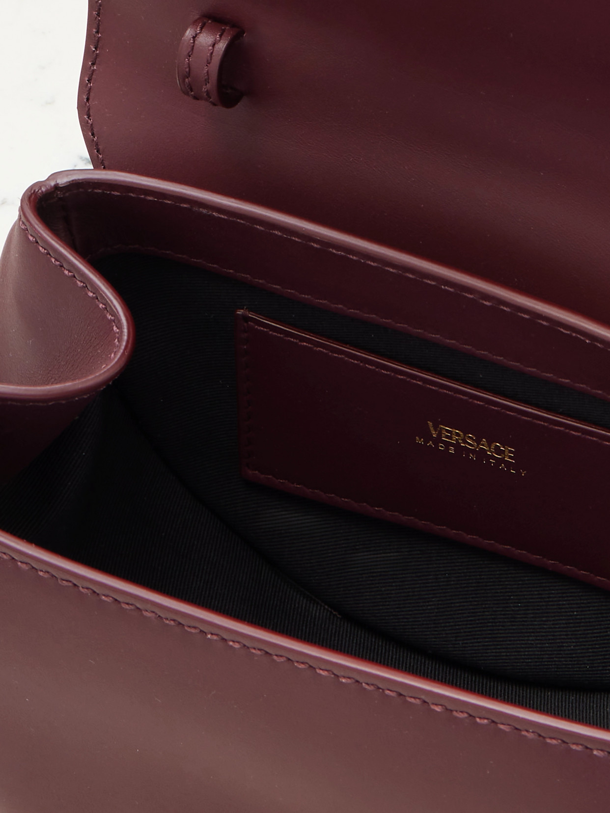 Versace Virtus Small Leather Shoulder Bag In Burgundy