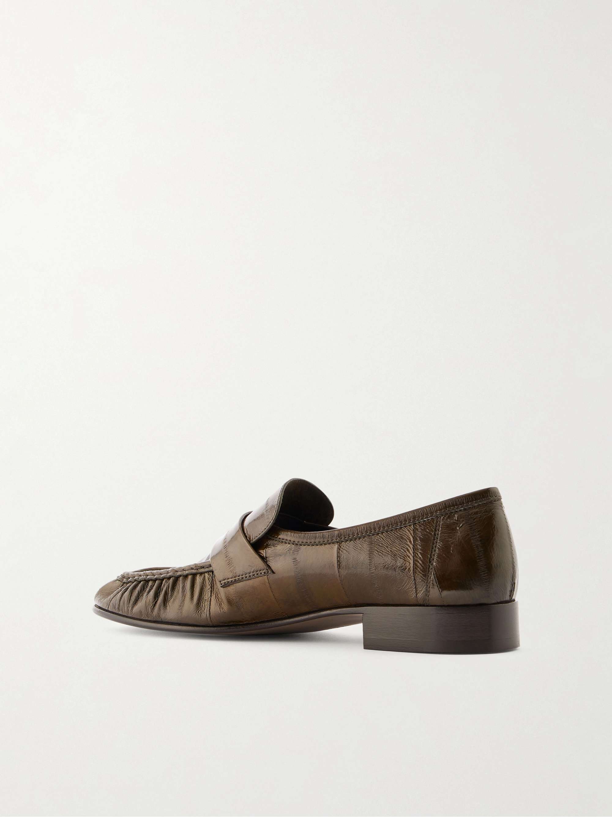 THE ROW Crinkled glossed-leather loafers