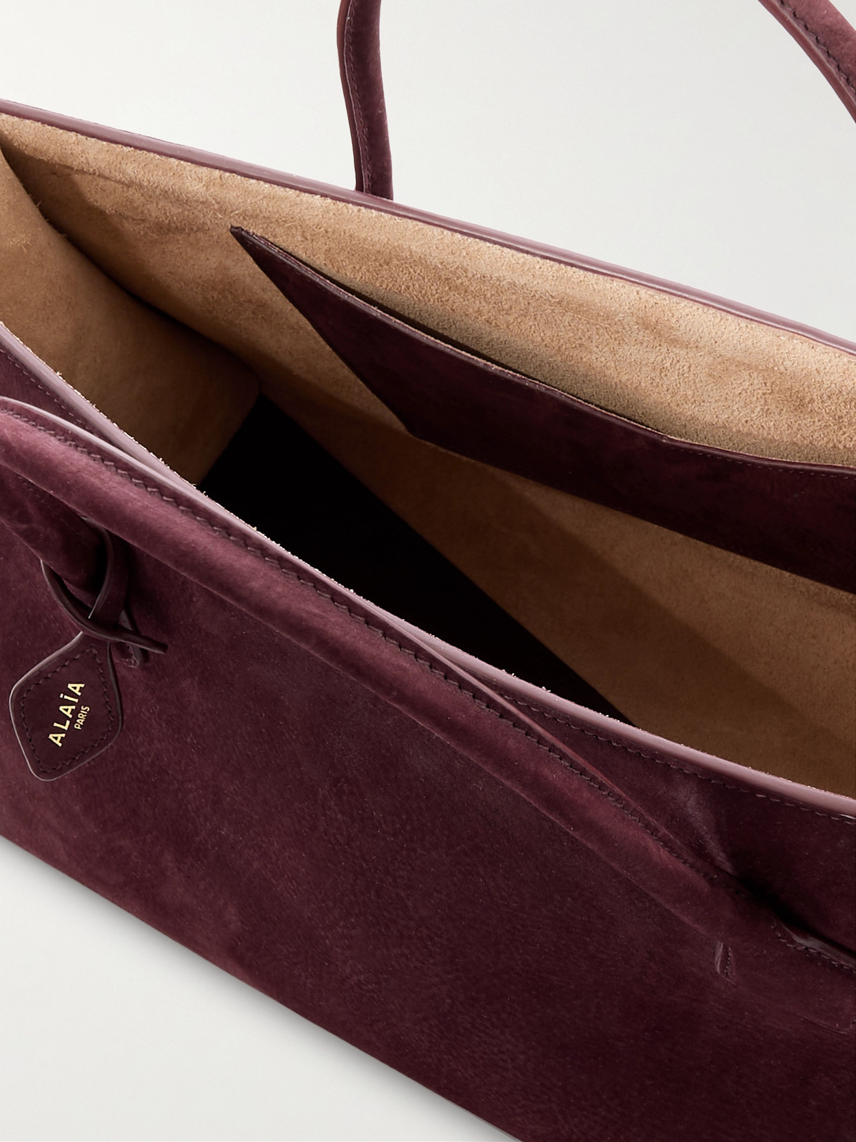 Alaïa East West Nubuck Tote In Burgundy