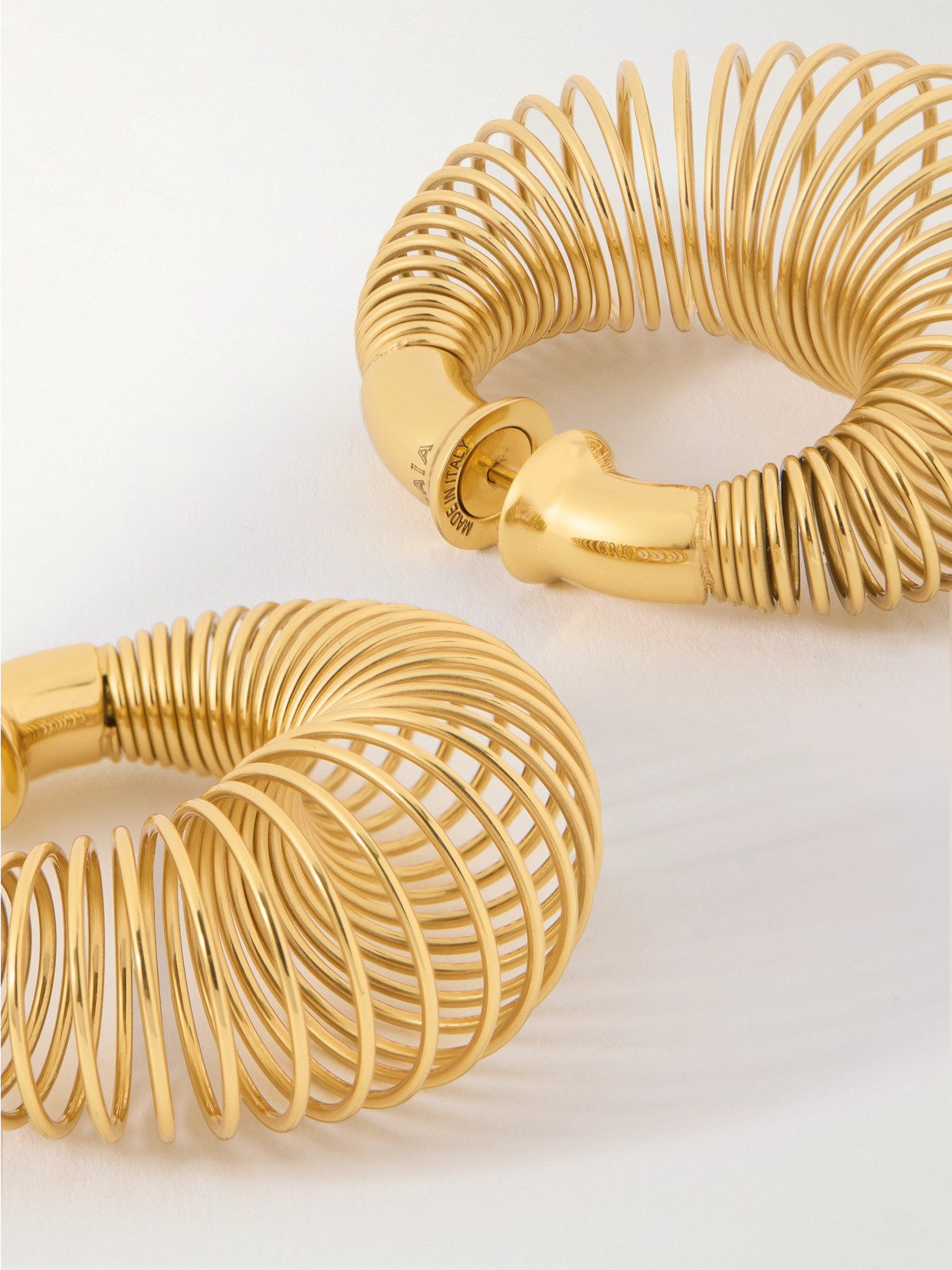 Alaïa Gold-tone Hoop Earrings In Gold