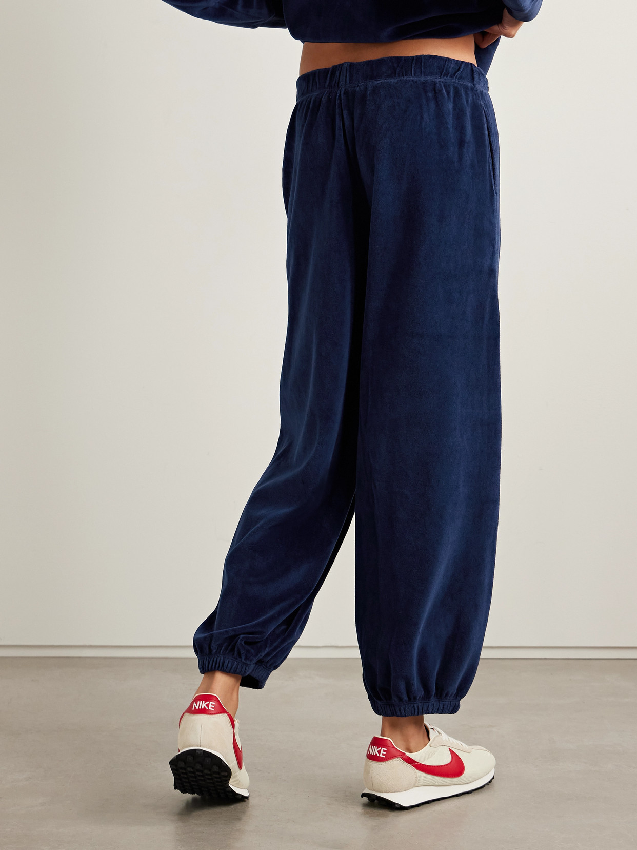 Suzie Kondi Paxos Cotton-blend Velour Tapered Sweatpants In Blue