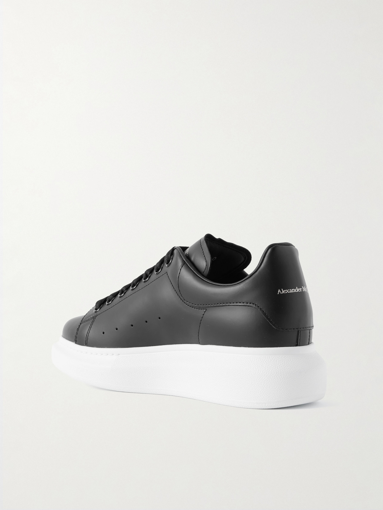 Alexander Mcqueen Women Black Low Top Sneakers With Logo Lettering On Tongue And Heel In Leather Wom
