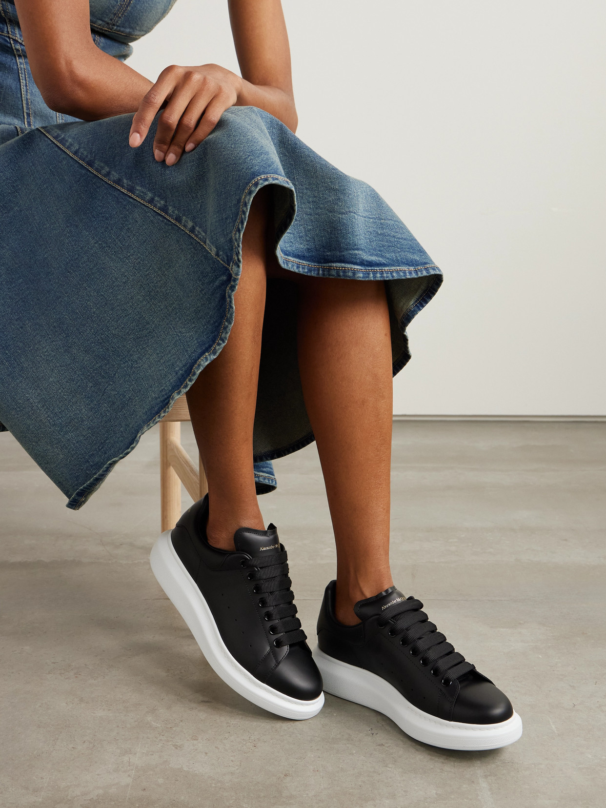 Alexander Mcqueen Women Black Low Top Sneakers With Logo Lettering On Tongue And Heel In Leather Wom