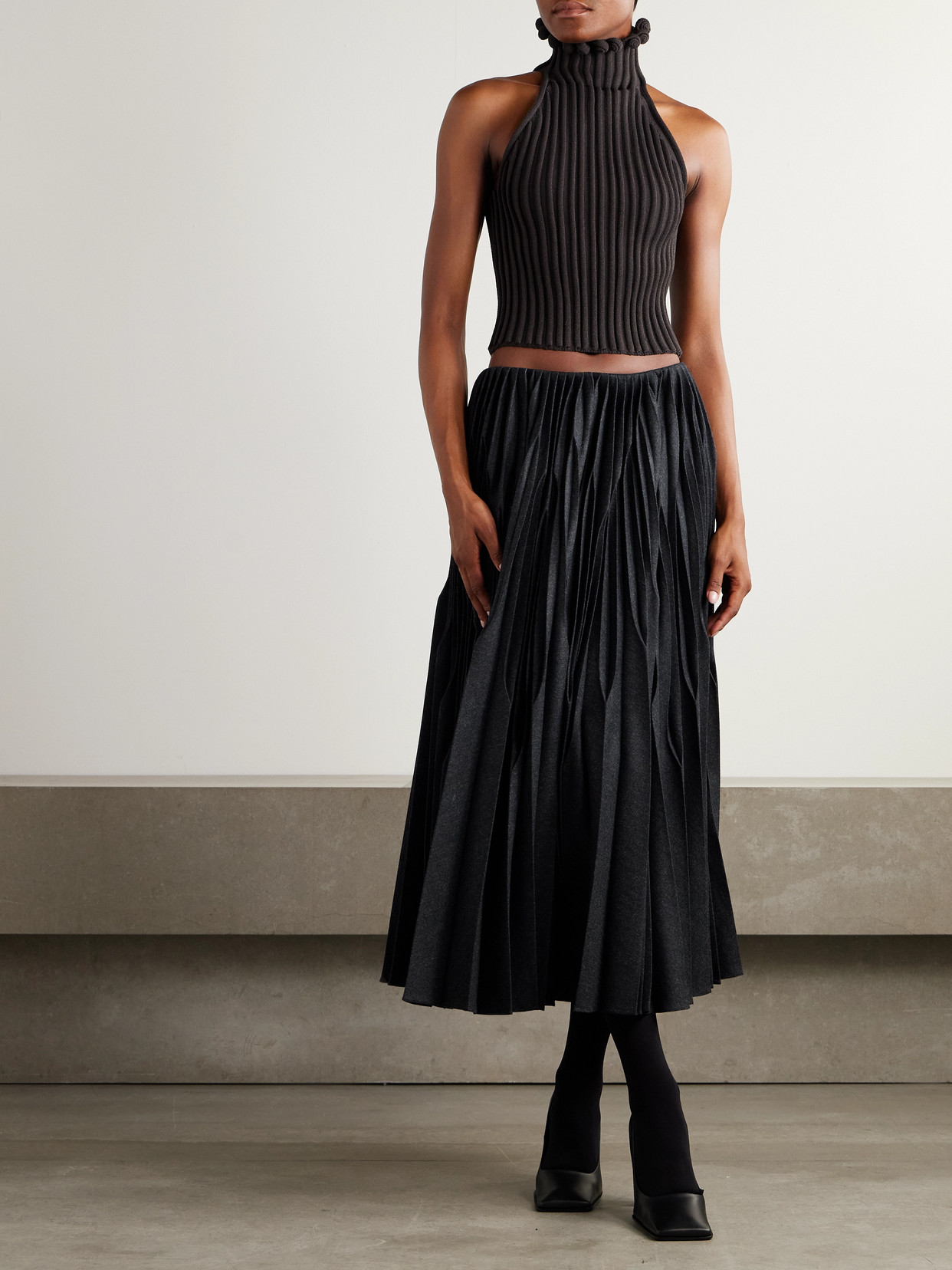 Alaïa Ribbed-knit Halter Top With Wavy Finish In Black