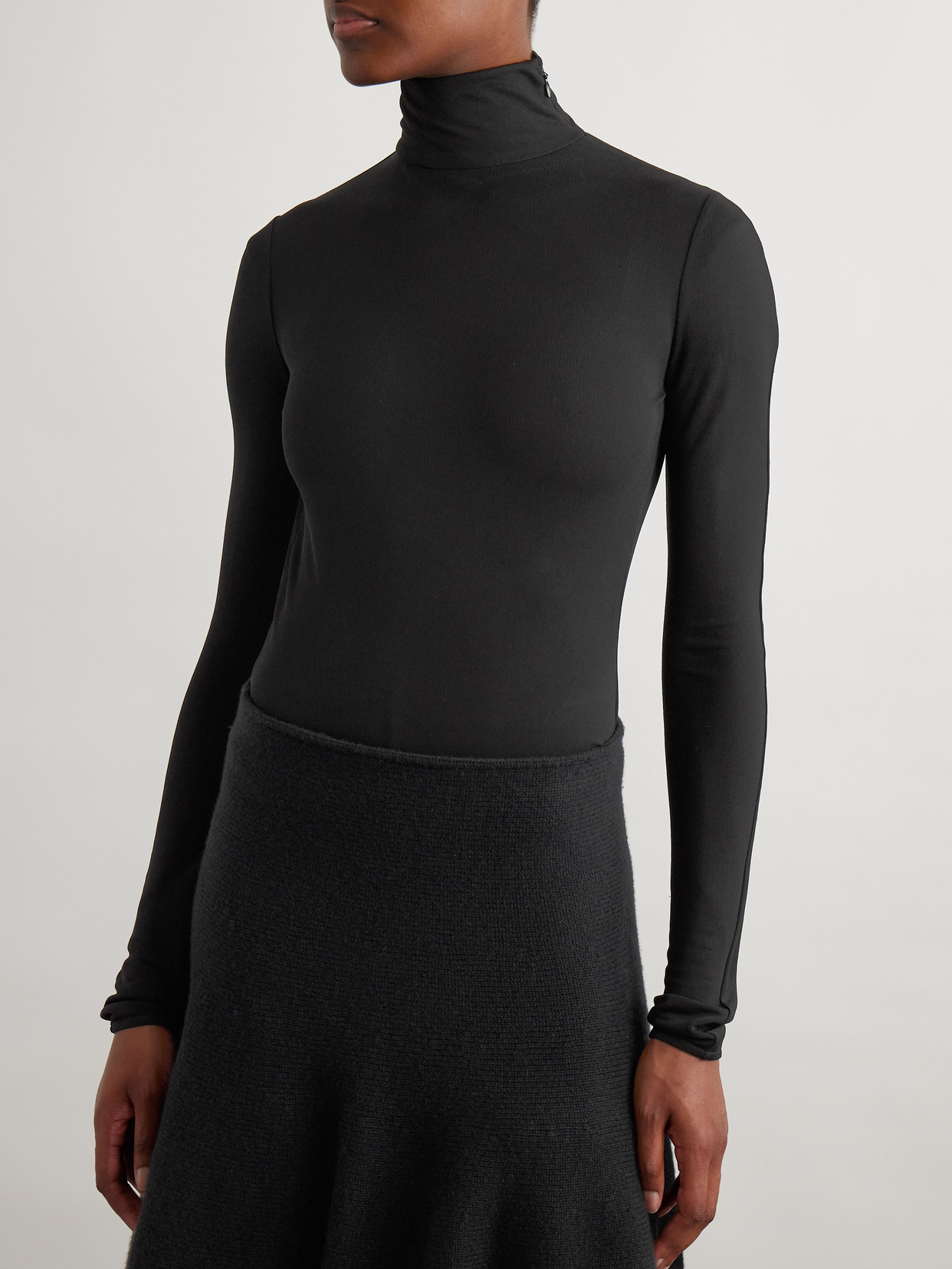 Alaïa Open-back Jersey Turtleneck Bodysuit In Black