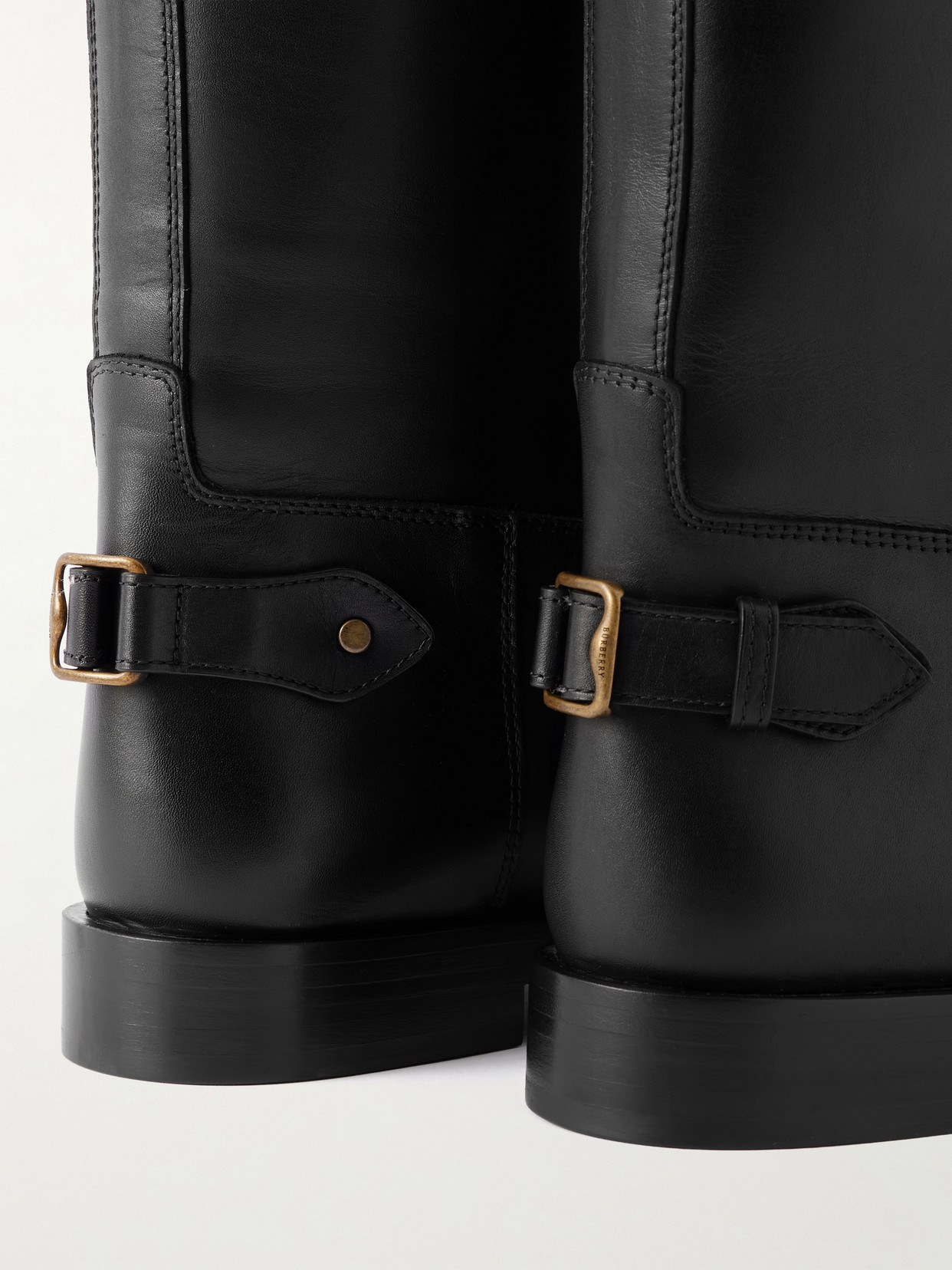 Burberry Buckled Leather Knee Boots In Black
