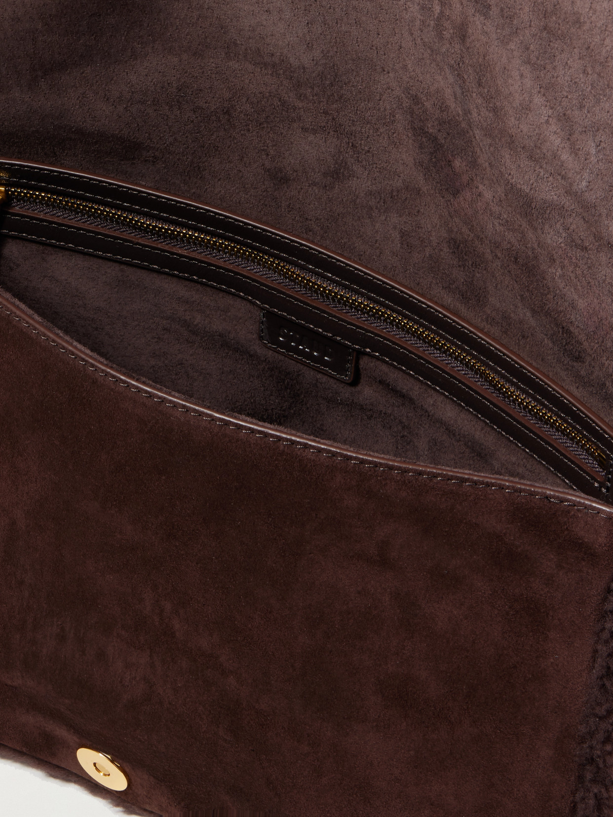 Staud Harlow Medium Buckled Shearling Shoulder Bag In Brown