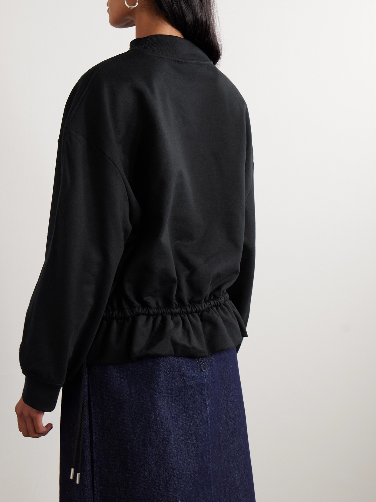 Dries Van Noten Cotton-jersey Peplum Sweatshirt In Black