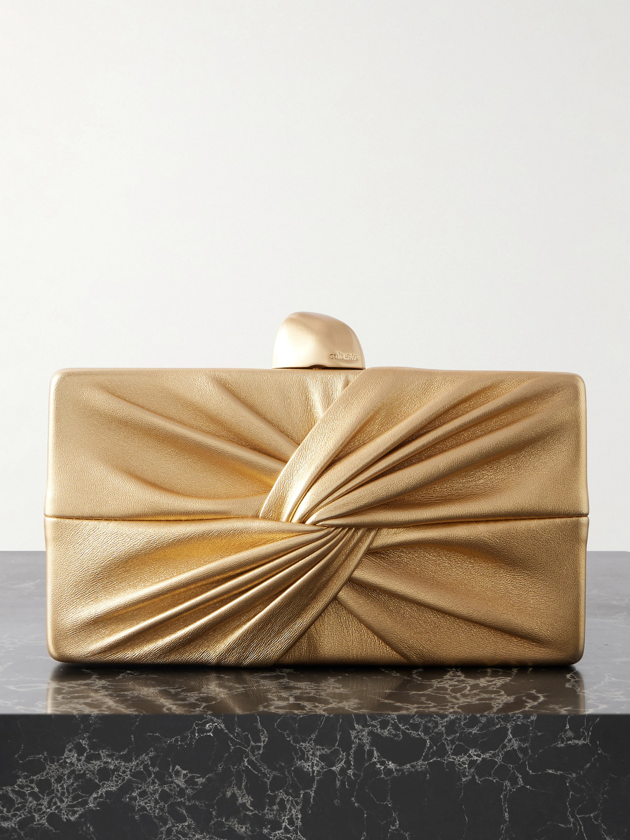 Cult Gaia Lisse Twist-front Metallic Leather Clutch In Silver