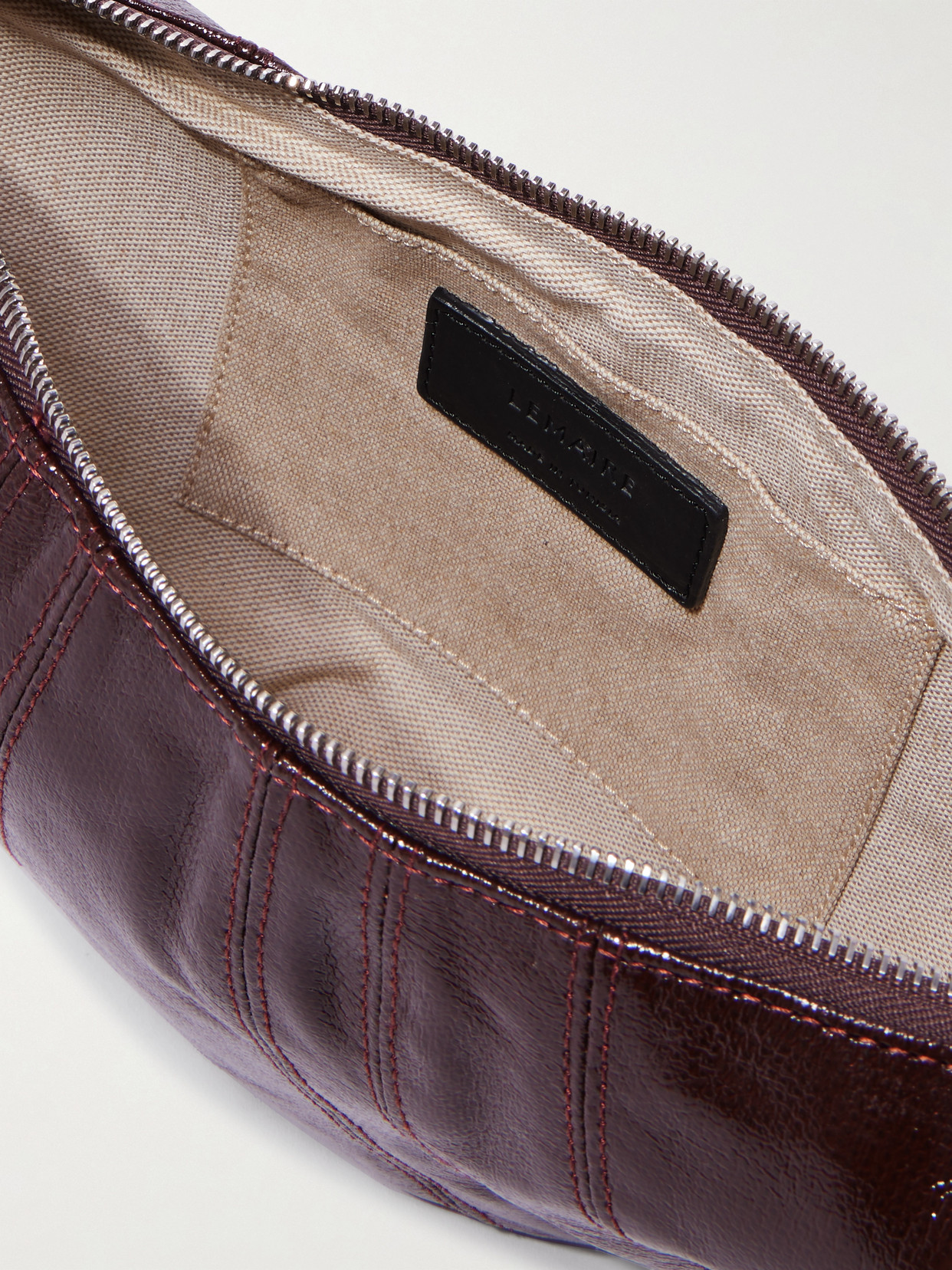 Lemaire Croissant Small Paneled Coated-canvas Shoulder Bag In Brown