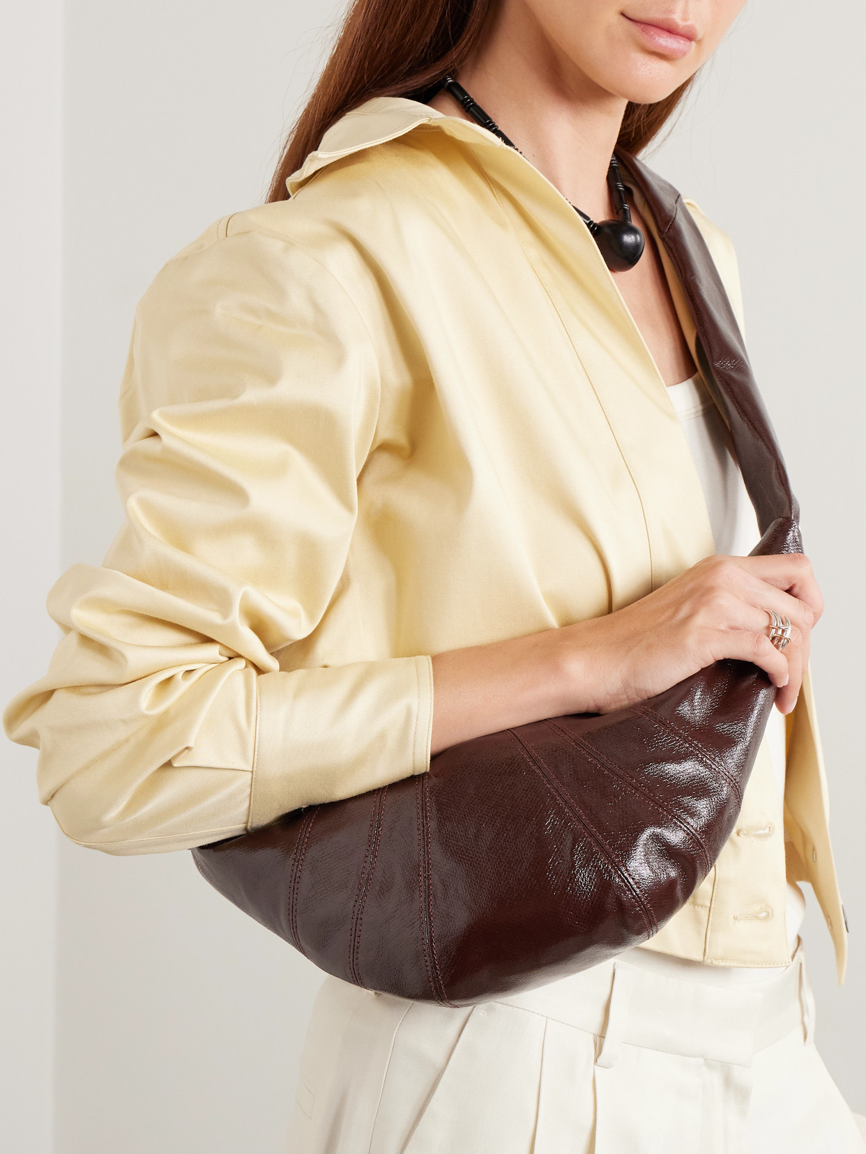 Lemaire Croissant Small Paneled Coated-canvas Shoulder Bag In Brown