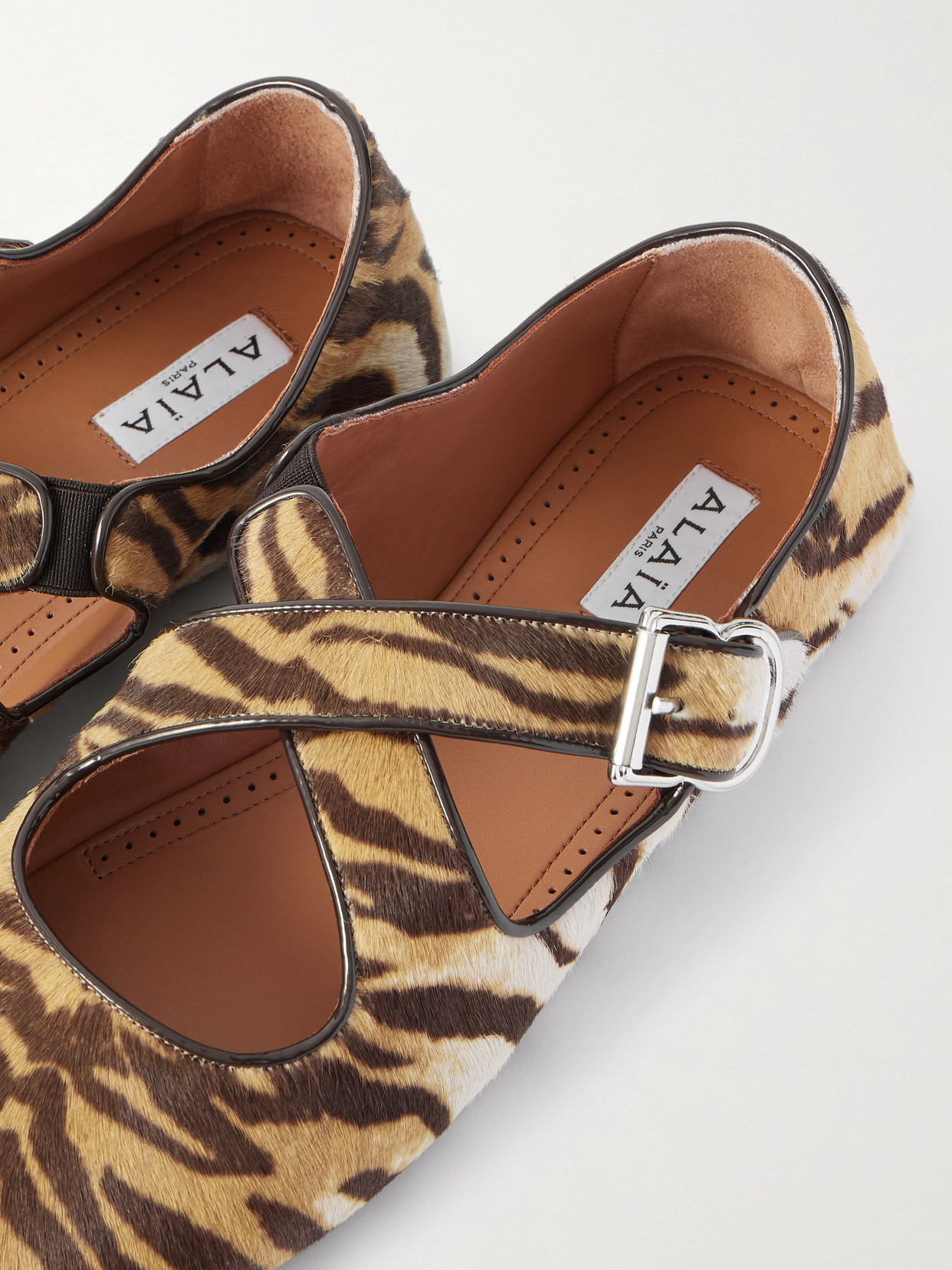Alaïa Criss Cross Patent-leather Trimmed Zebra-print Calf Hair Ballet Flats In Animal Print