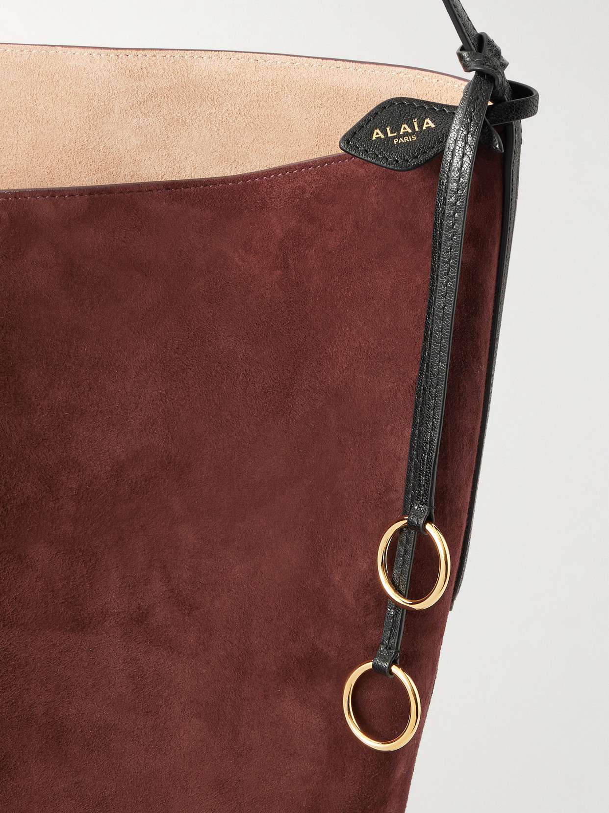 Alaïa Hip Large Logo-detailed Leather-trimmed Suede Bucket Bag In Brown