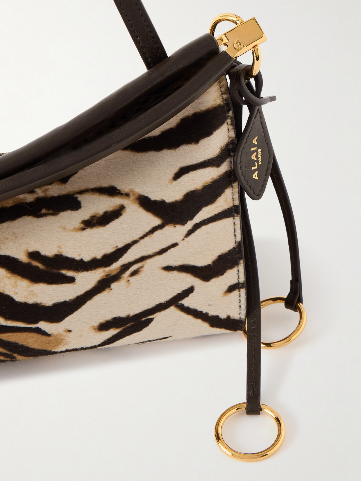 Alaïa Le Click Ew Medium Tiger-print Calf Hair And Leather Shoulder Bag In Multi