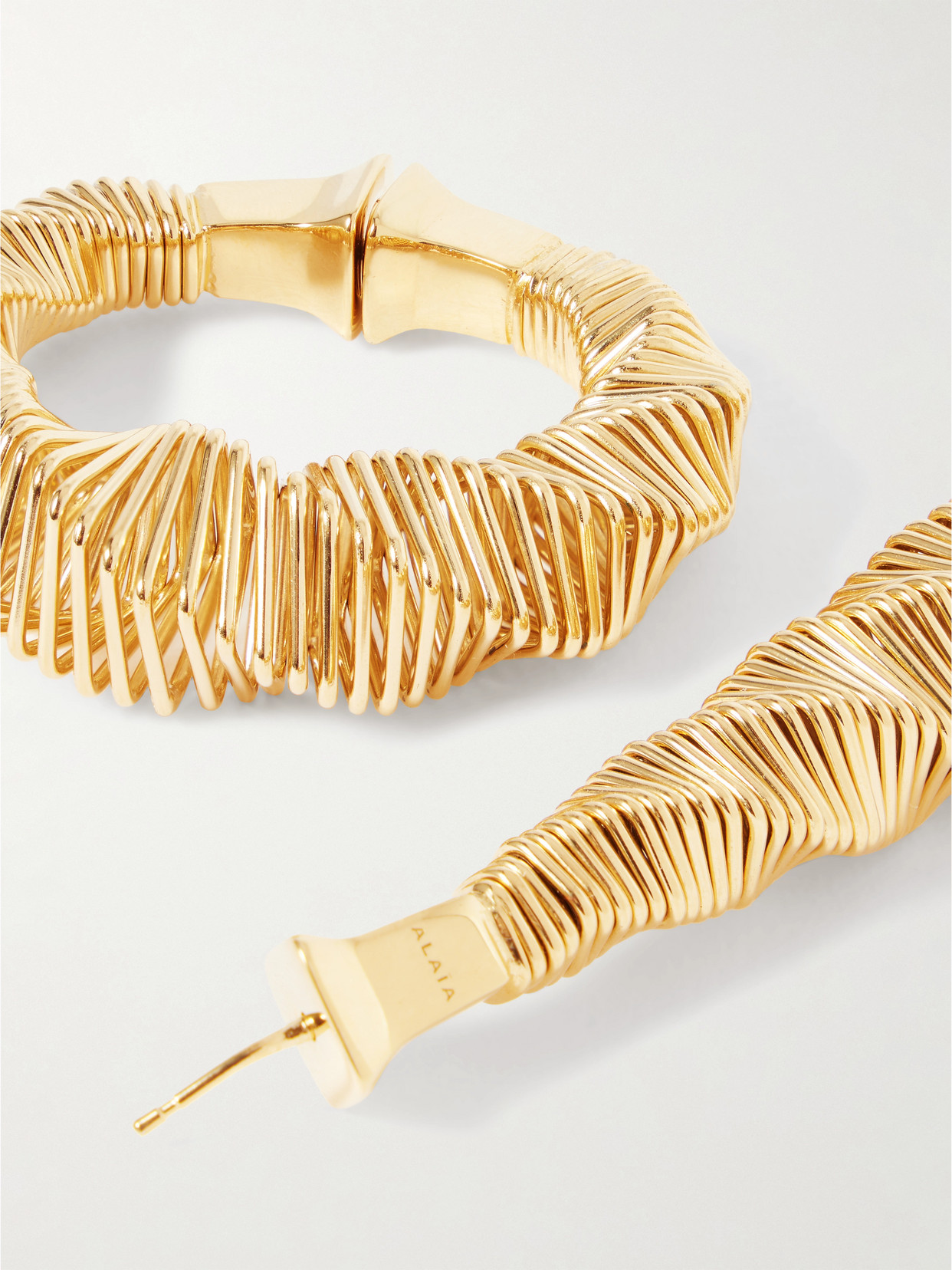 Alaïa Gold-tone Hoop Earrings In Gold