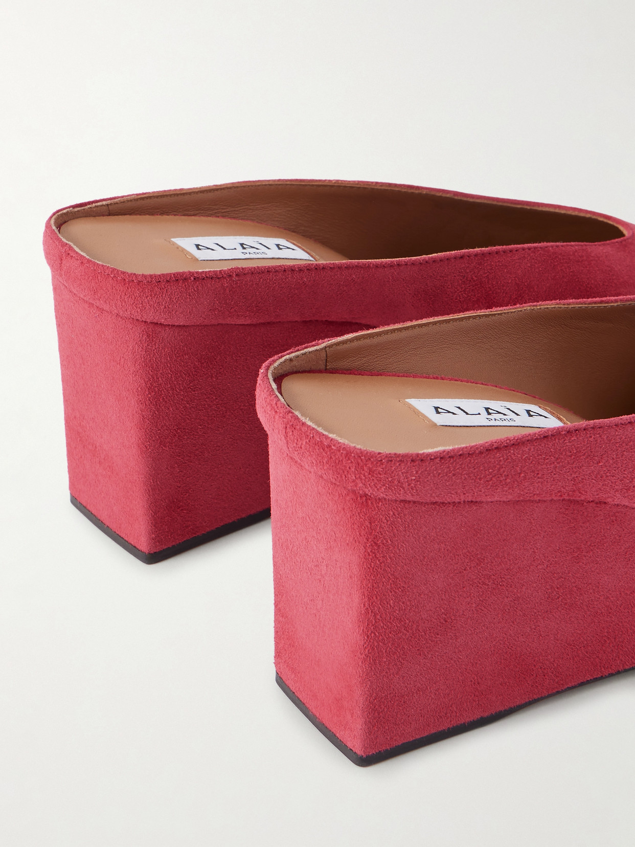 Alaïa 75 Suede Point-toe Wedge Mules In Pink