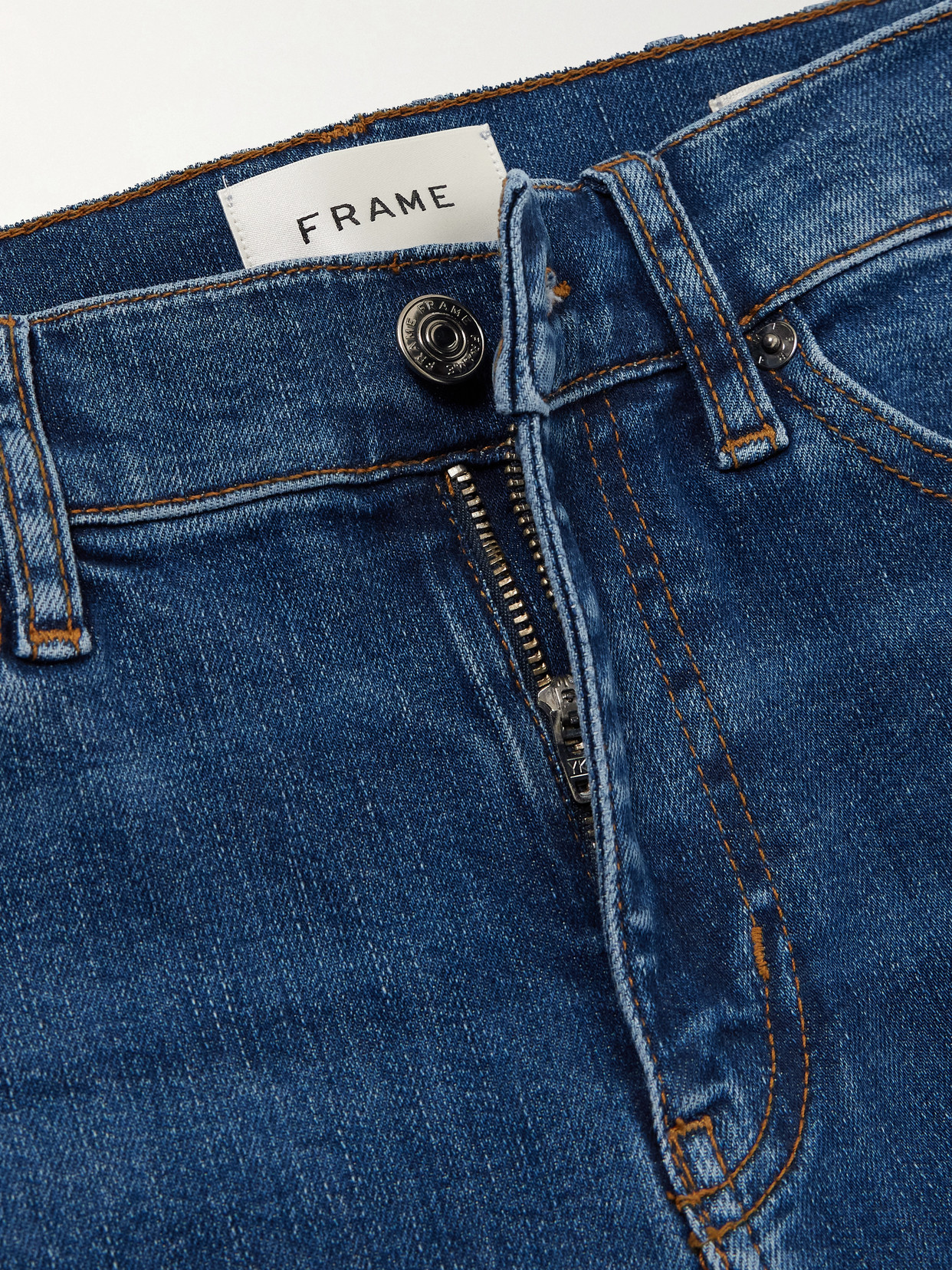 Frame The Icon Mid-rise Flared Jeans In Blue