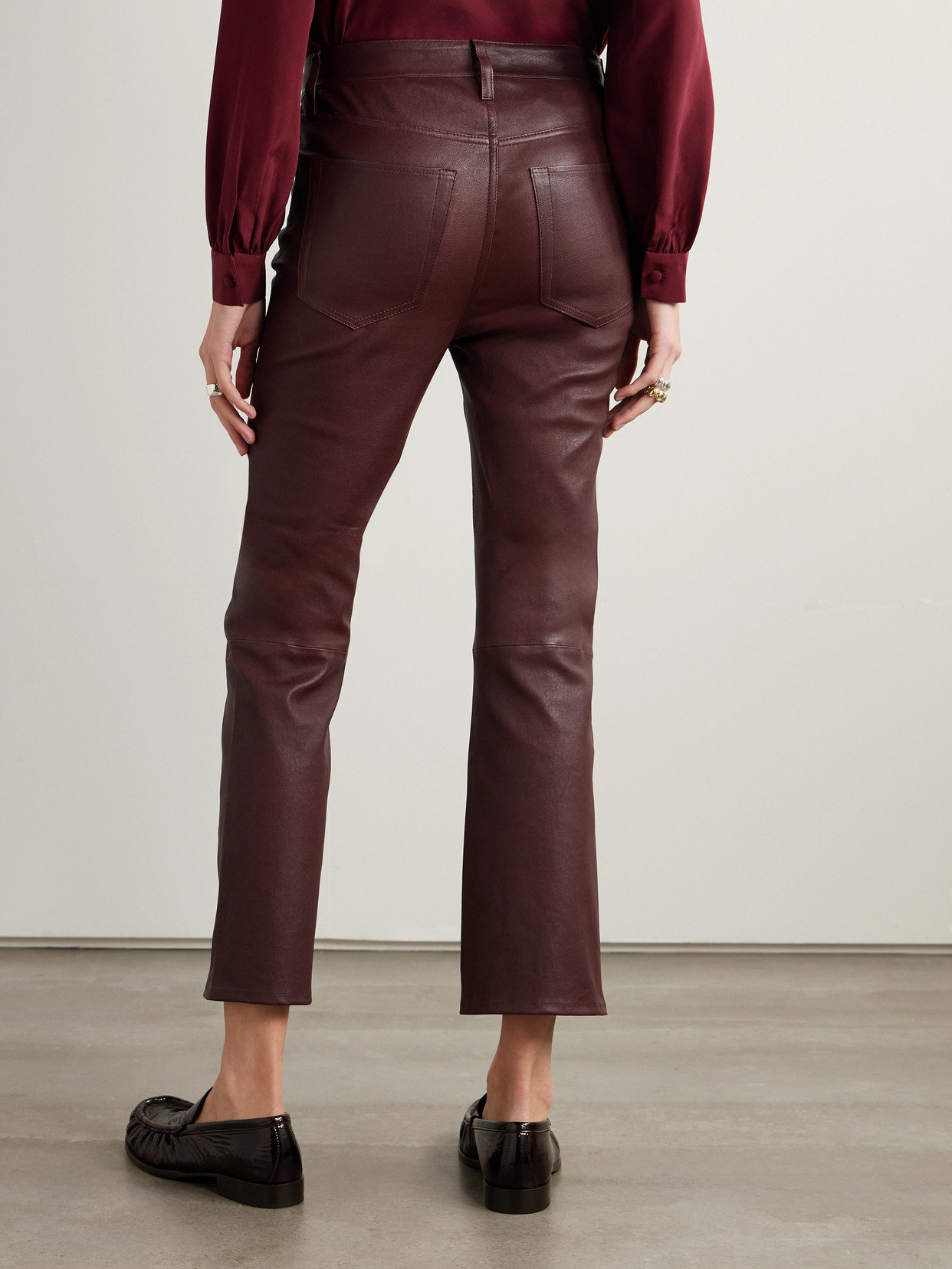 Frame Le Crop Mini Boot Cropped Leather Flared Pants In Burgundy