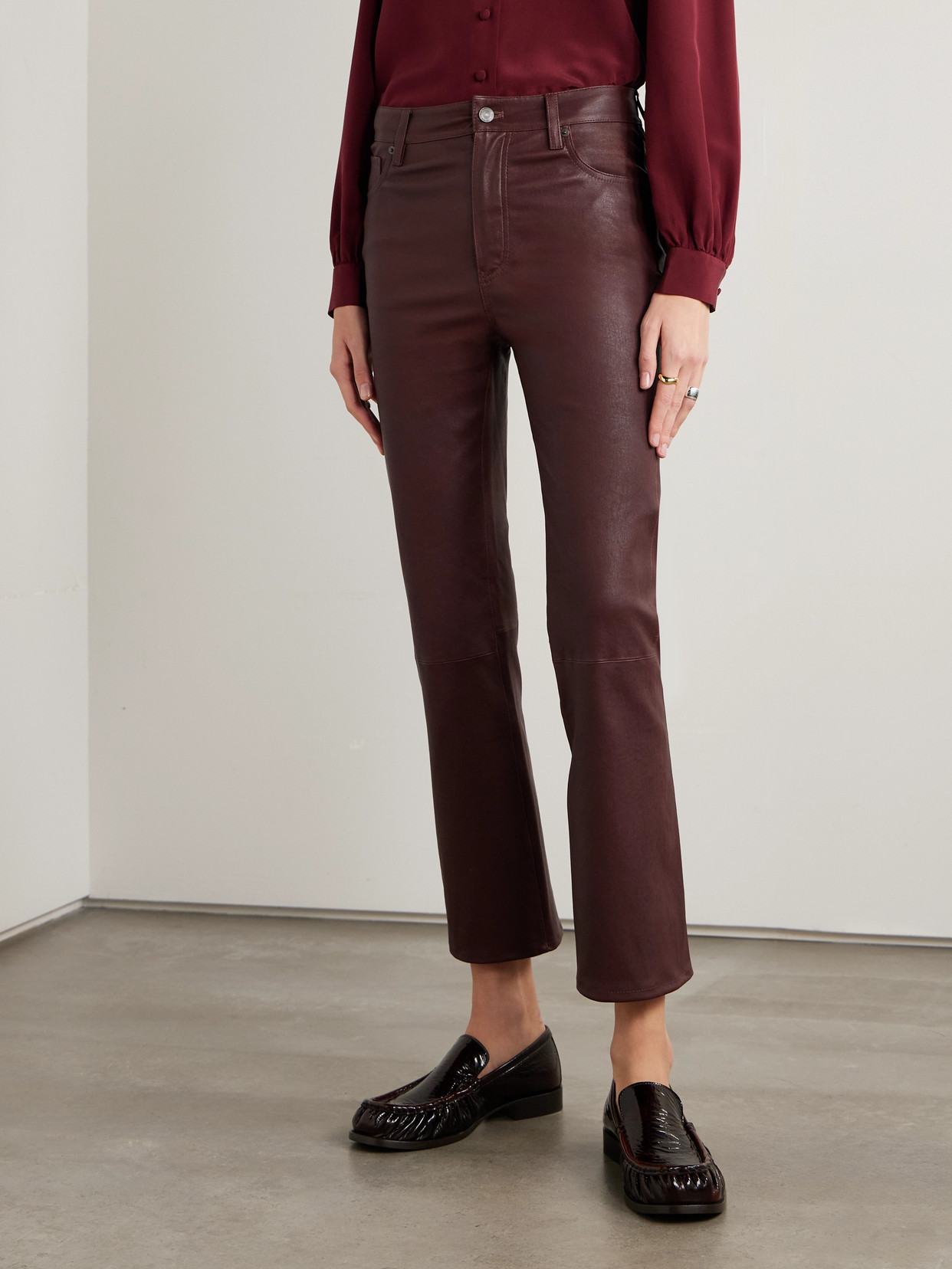 Frame Le Crop Mini Boot Cropped Leather Flared Pants In Burgundy