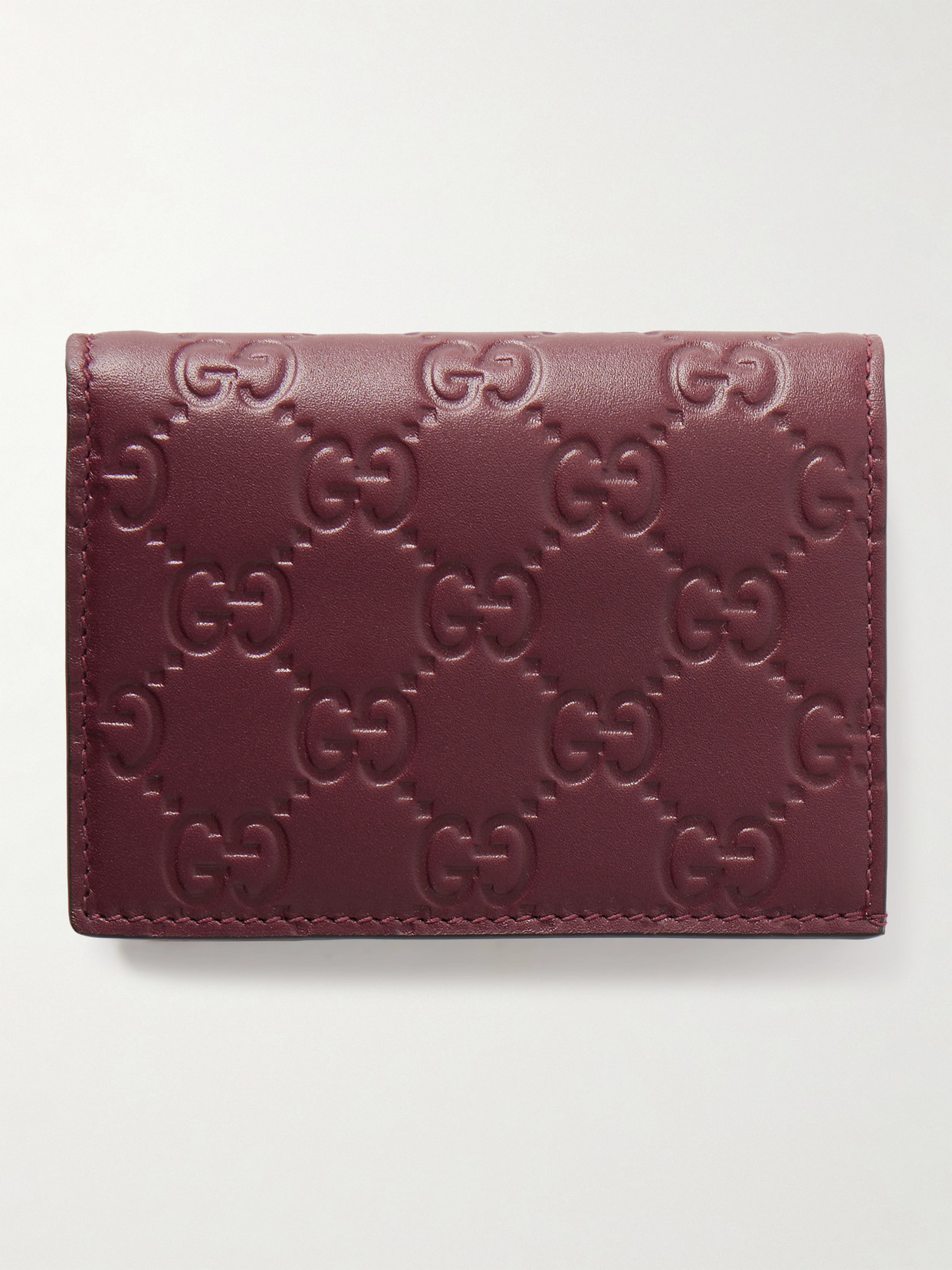 Gucci Gg Emblem Mini Debossed Leather Wallet In Burgundy