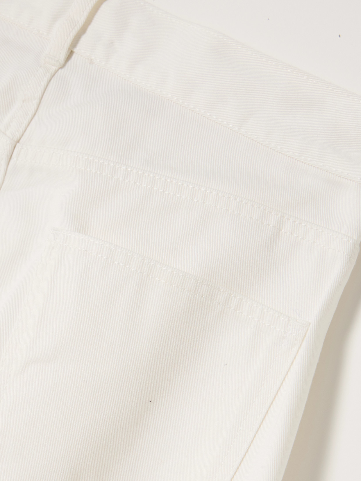 Twisted Paneled High-Rise Jeans