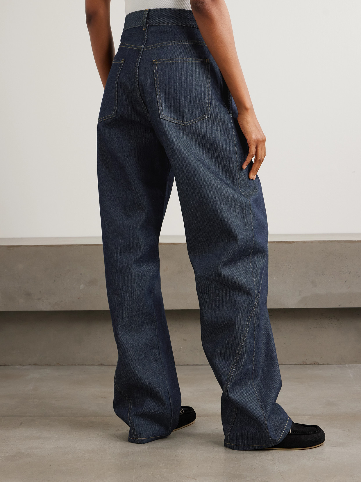 Jw Anderson Twisted Asymmetric Embroidered High-rise Jeans In Blue