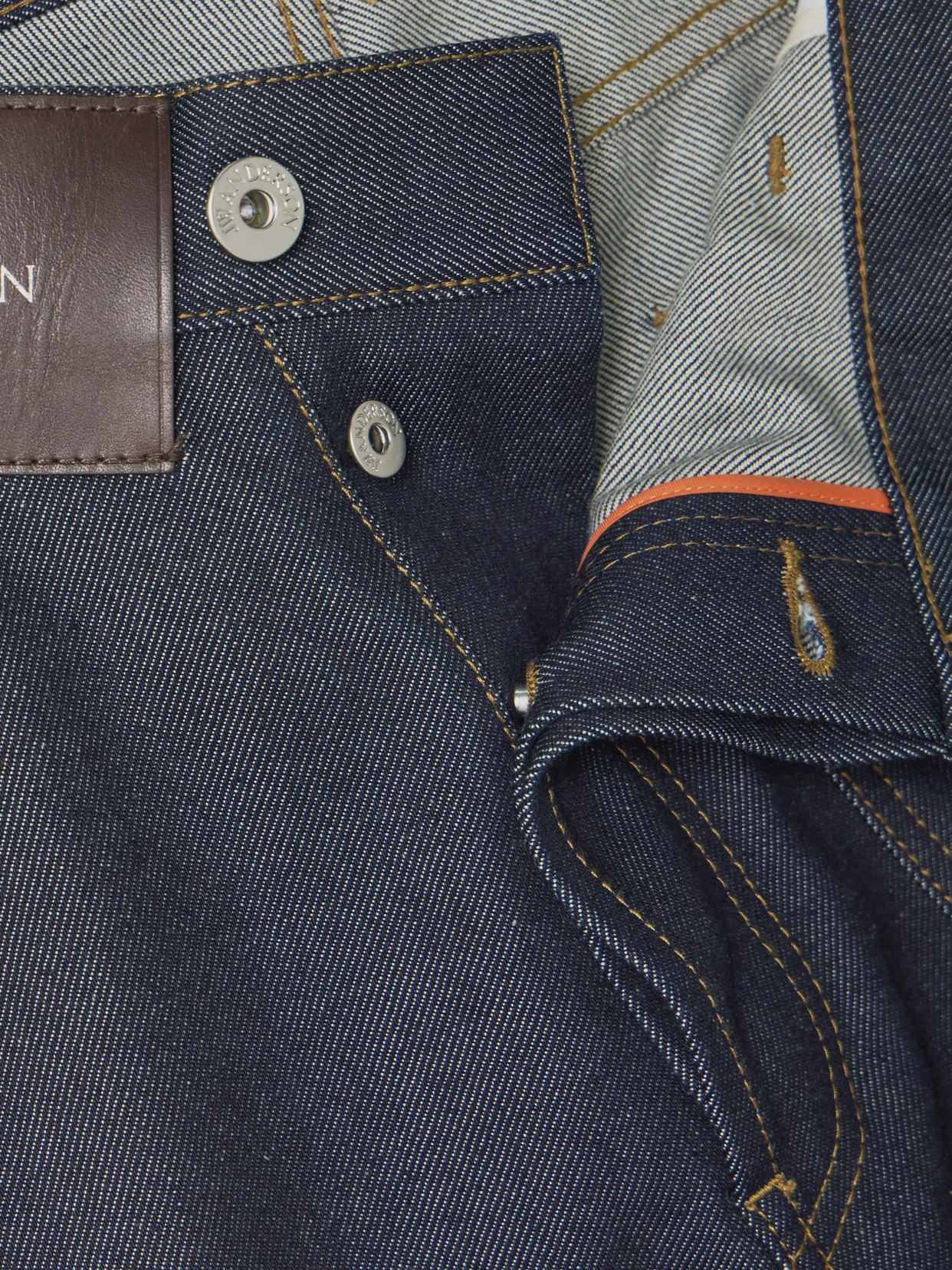 Jw Anderson Twisted Asymmetric Embroidered High-rise Jeans In Blue