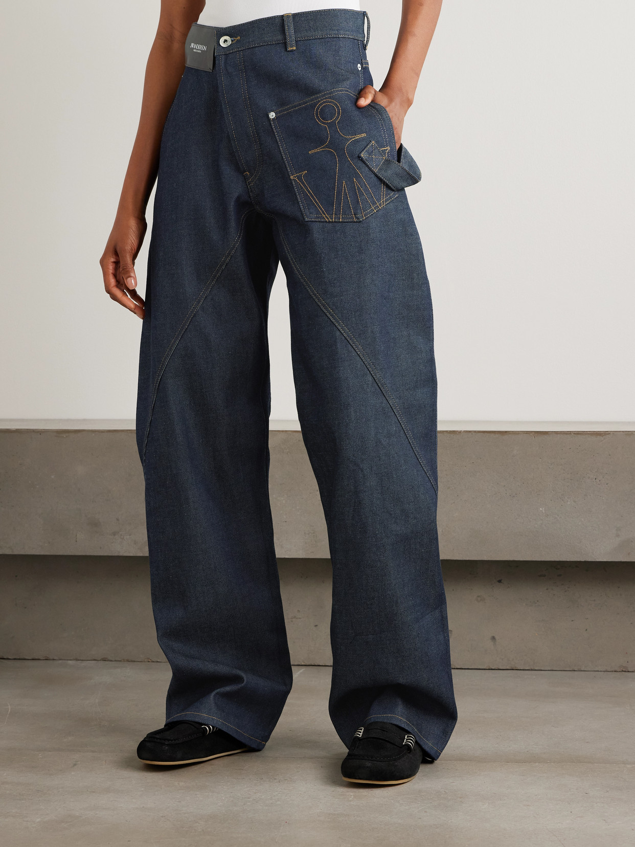 Jw Anderson Twisted Asymmetric Embroidered High-rise Jeans In Blue