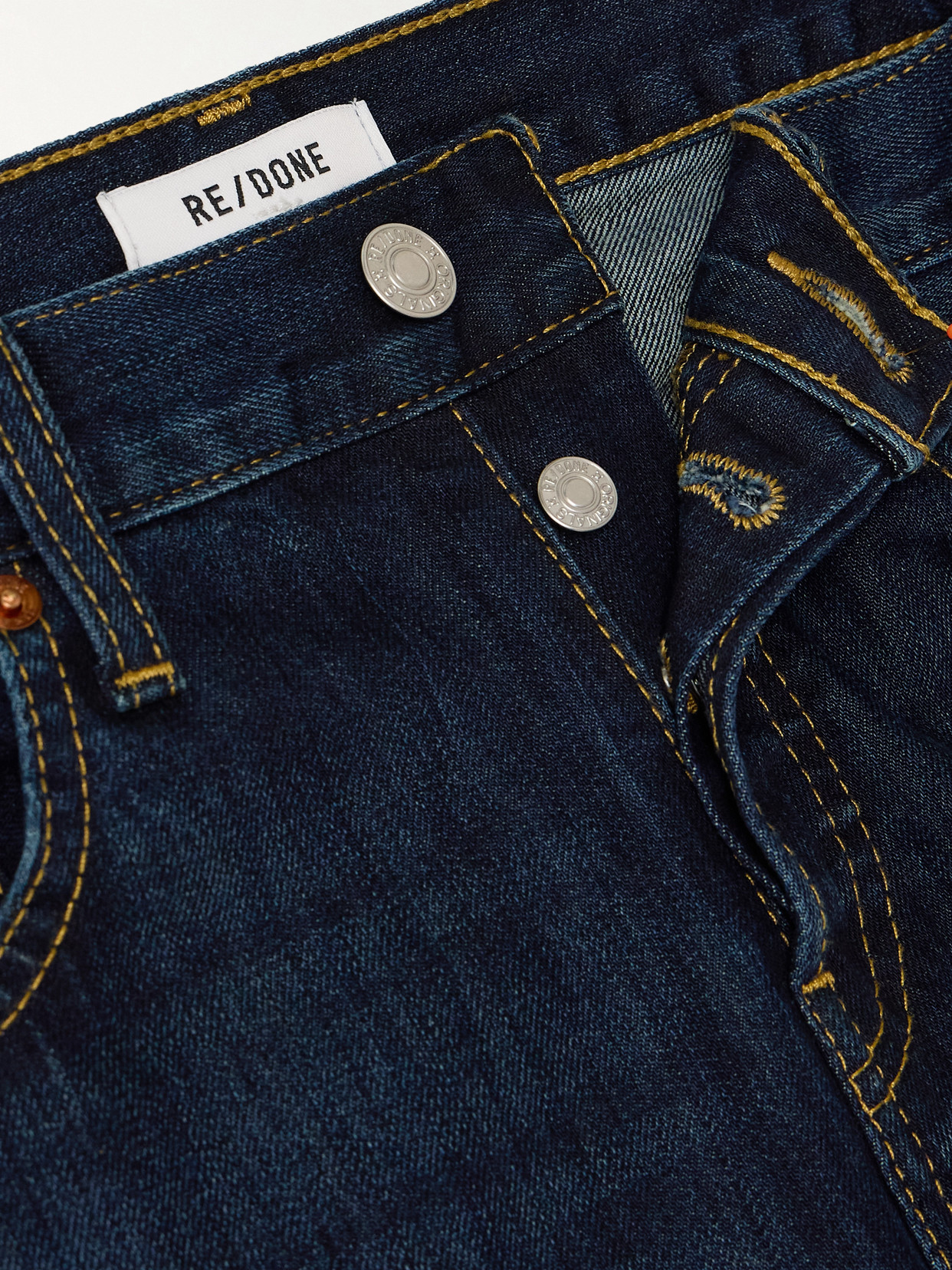 Re/Done - Twisted Mid-Rise Bootcut Jeans