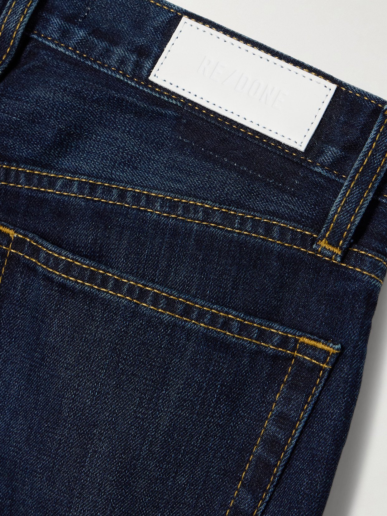 Re/Done - Twisted Mid-Rise Bootcut Jeans