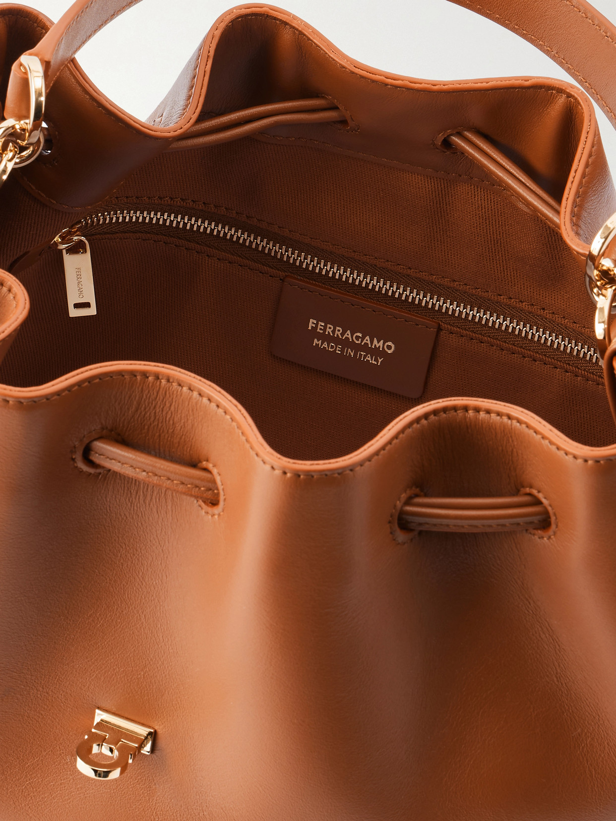 Ferragamo Hug Buckle Leather Bucket Bag In Brown