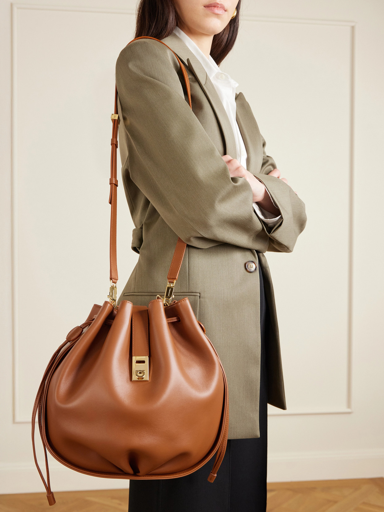 Ferragamo Hug Buckle Leather Bucket Bag In Brown