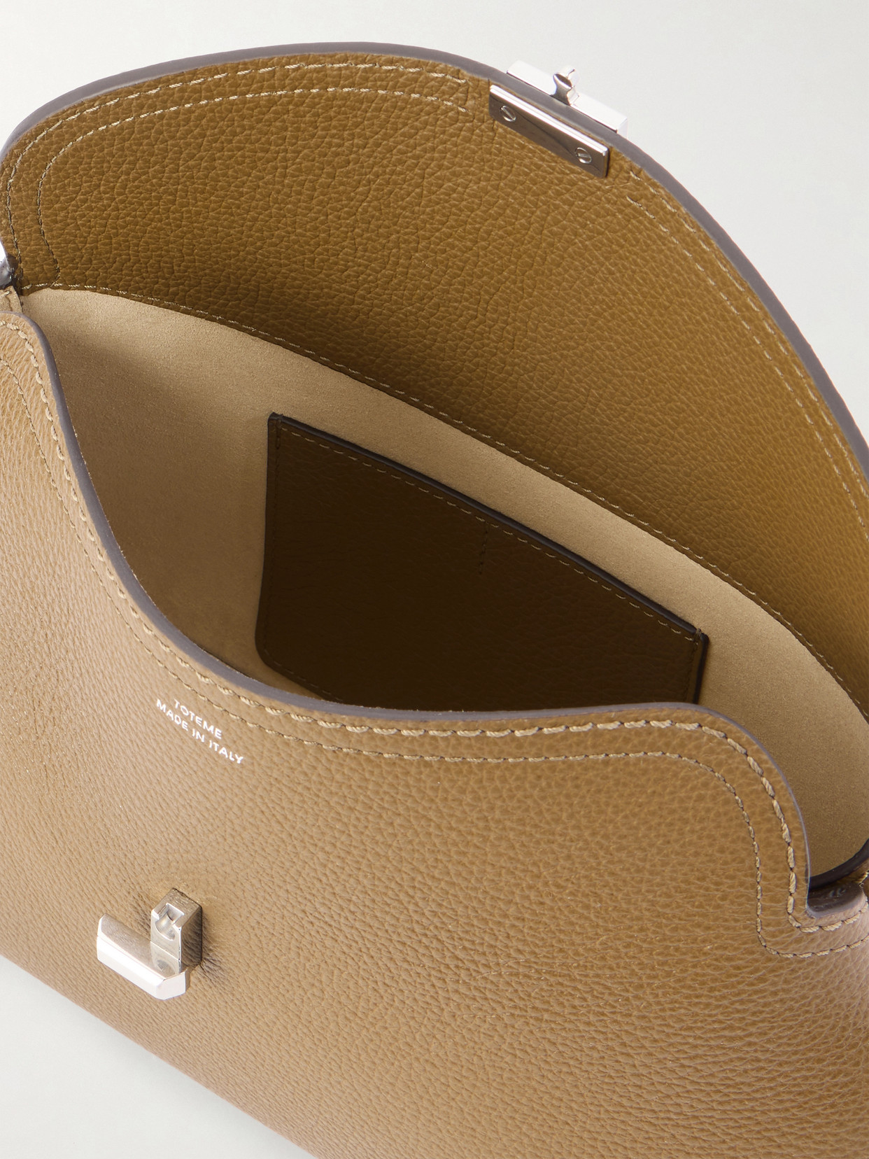 Totême T-lock Textured-leather Clutch In Brown