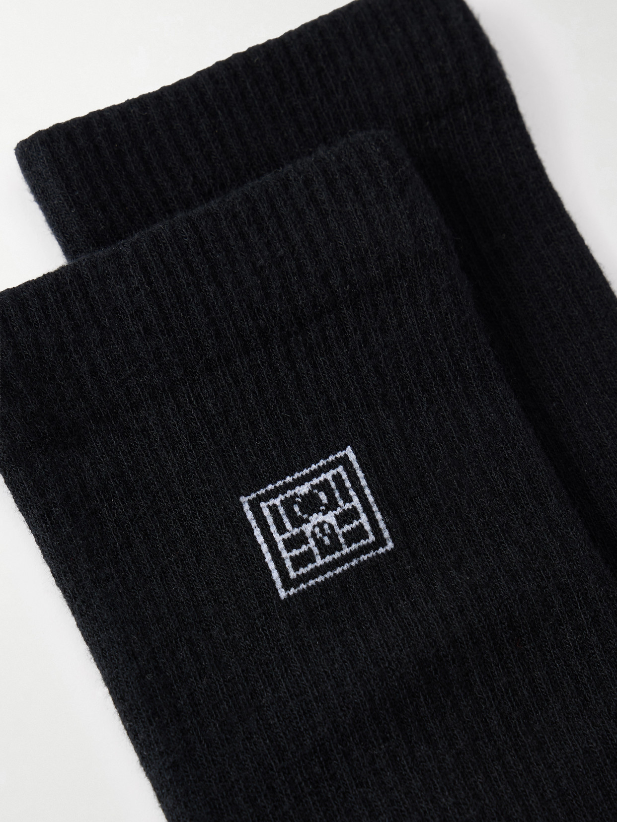 Totême Embroidered Ribbed Cotton-blend Socks In Black