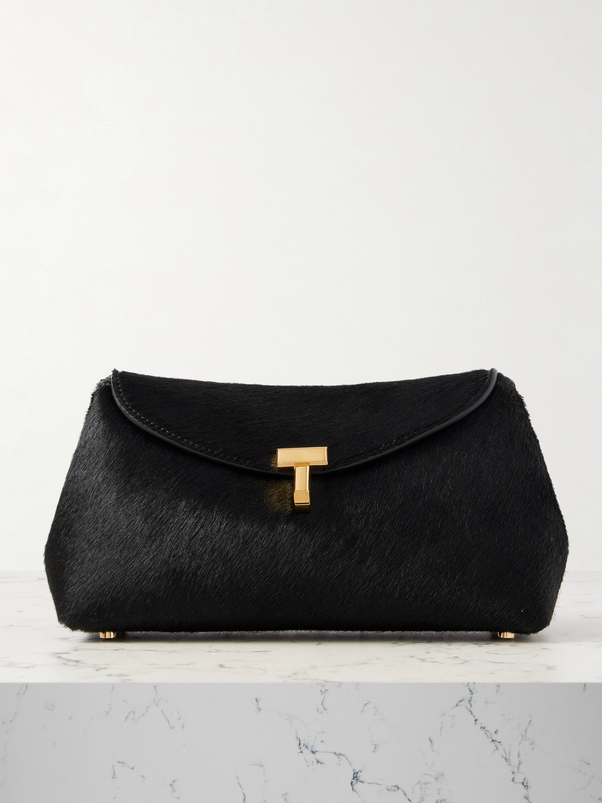 Totême T-lock Mini Calf Hair Clutch In Black