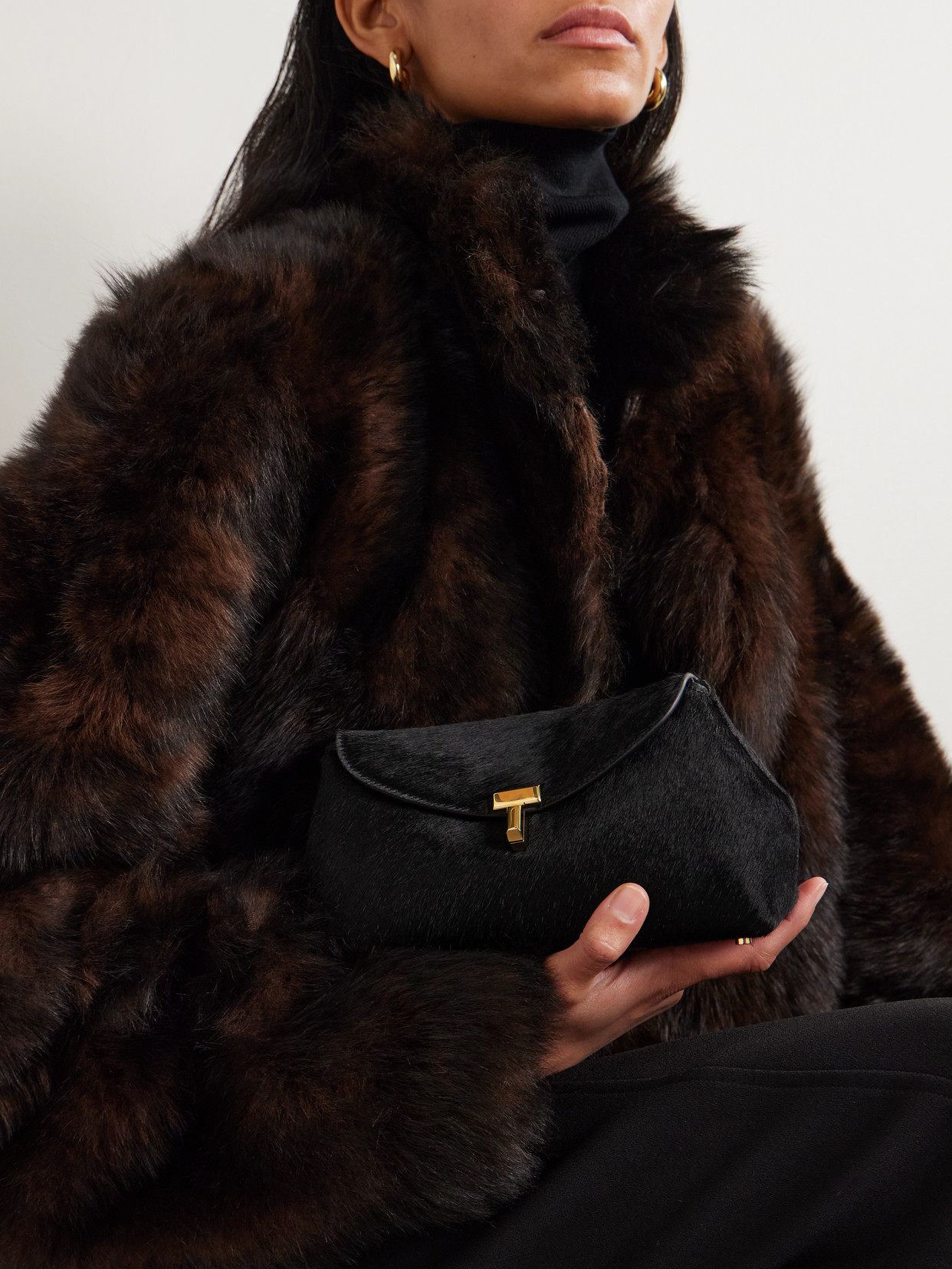 Totême T-lock Mini Calf Hair Clutch In Black