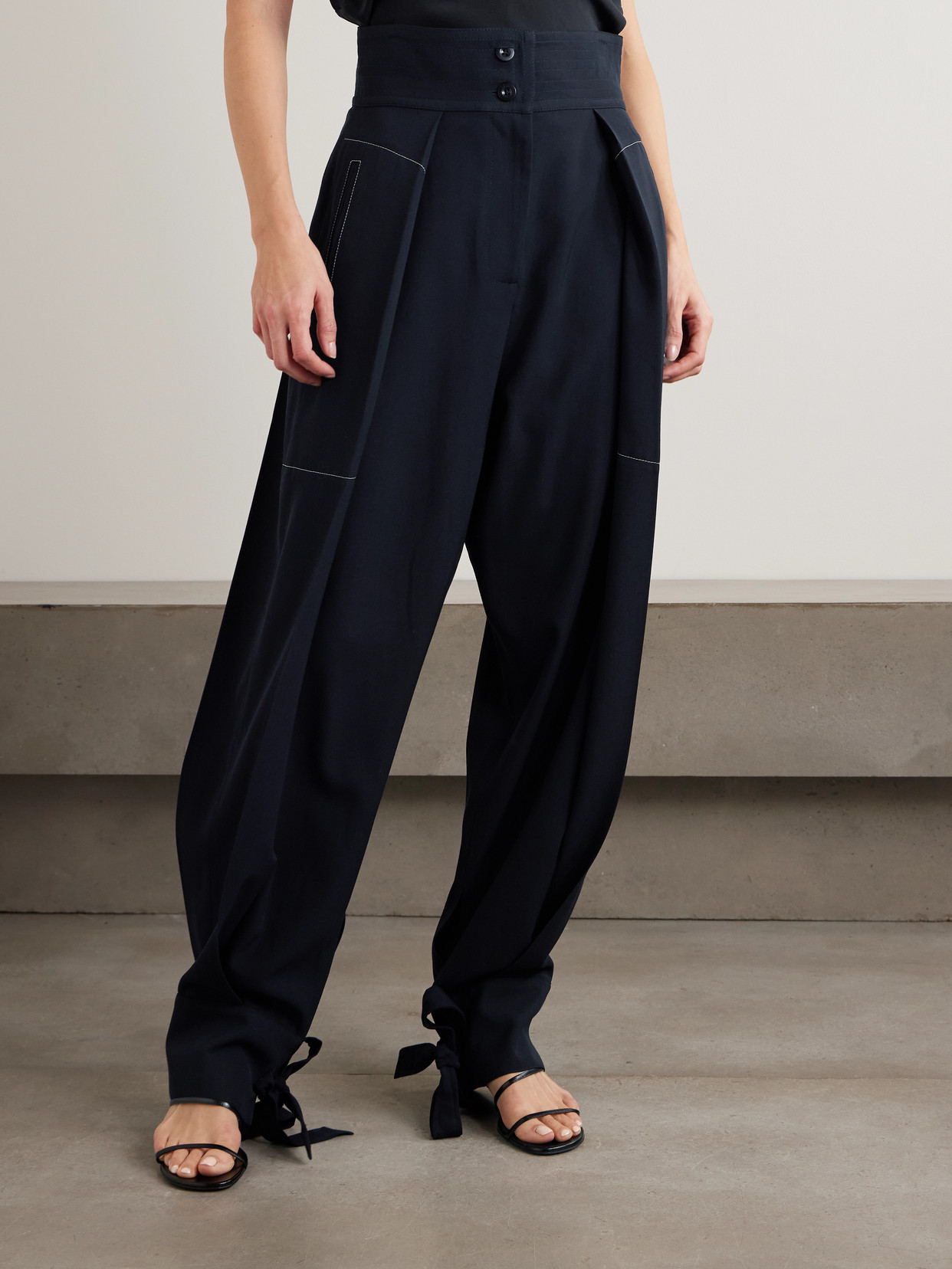 Sharon Wauchob Arch Topstitched Paneled Pleated Wool-twill Tapered Pants In Blue