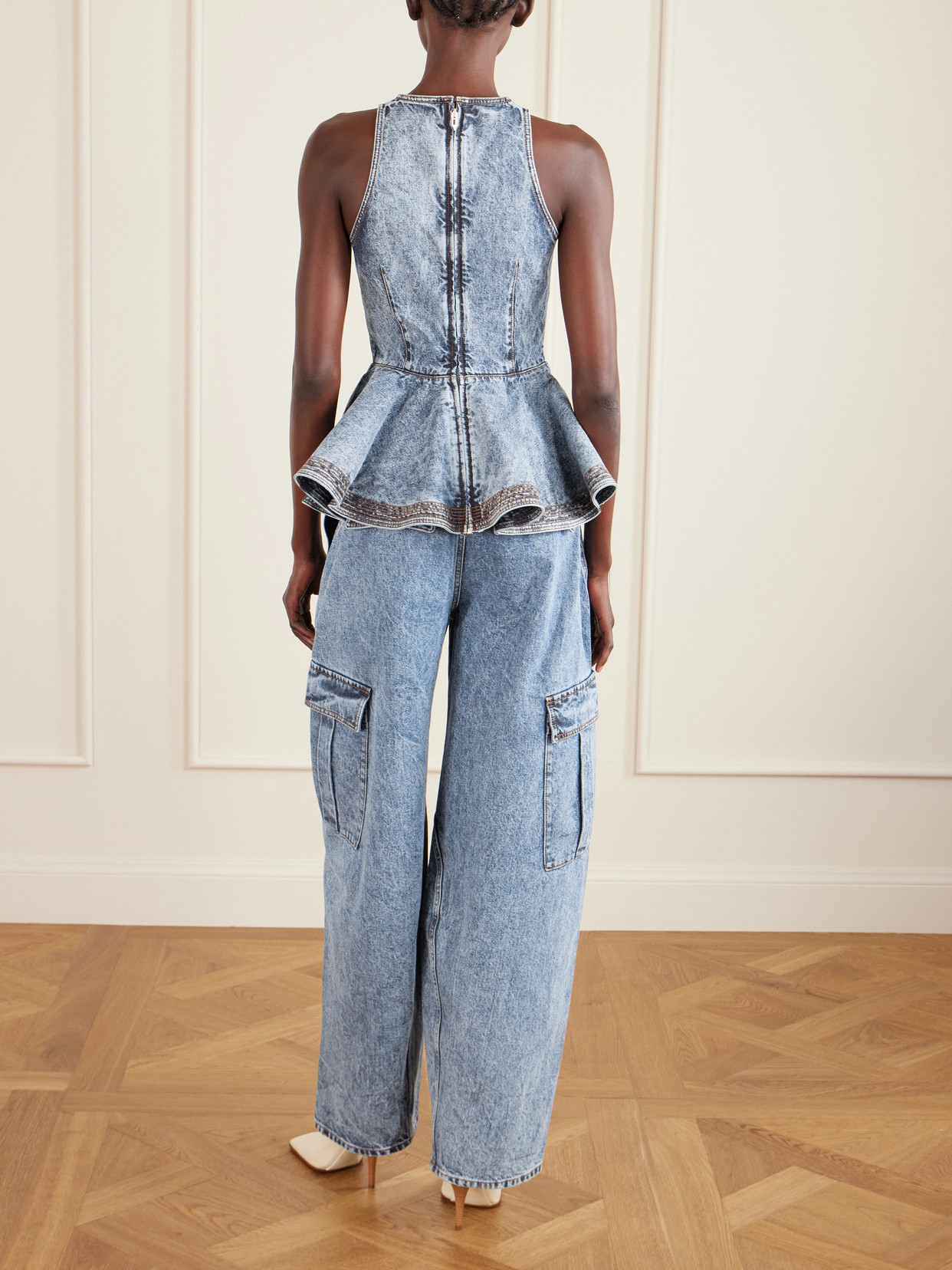 Alaïa Alaia Peplum Halterneck Top With Ruched Hem And Fitted Waist In Blue